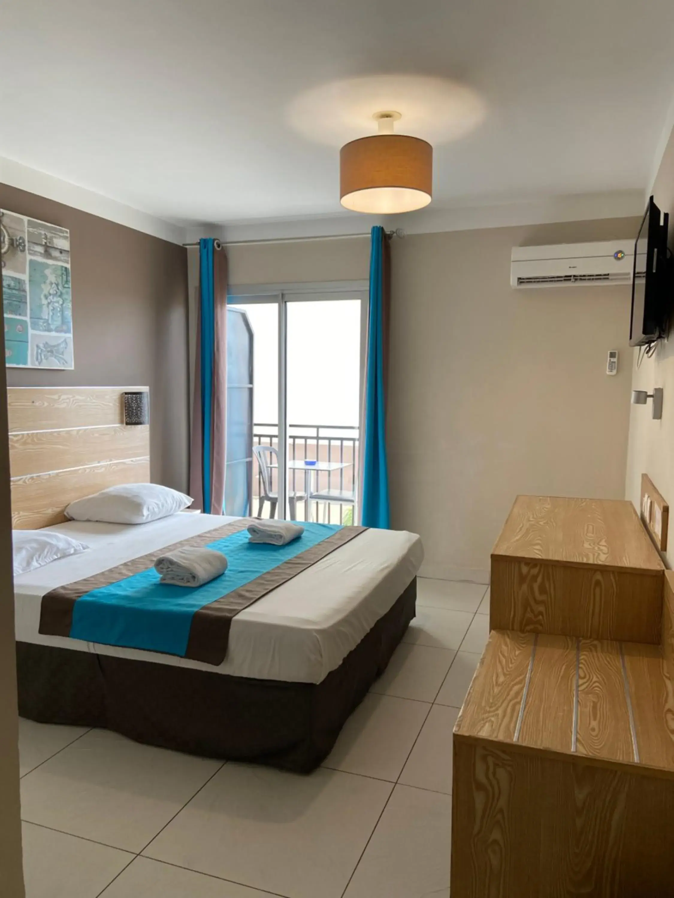 Bedroom, Bed in Hôtel Select - Réunion Bedroom, Bed in Hôtel Select - Réunion