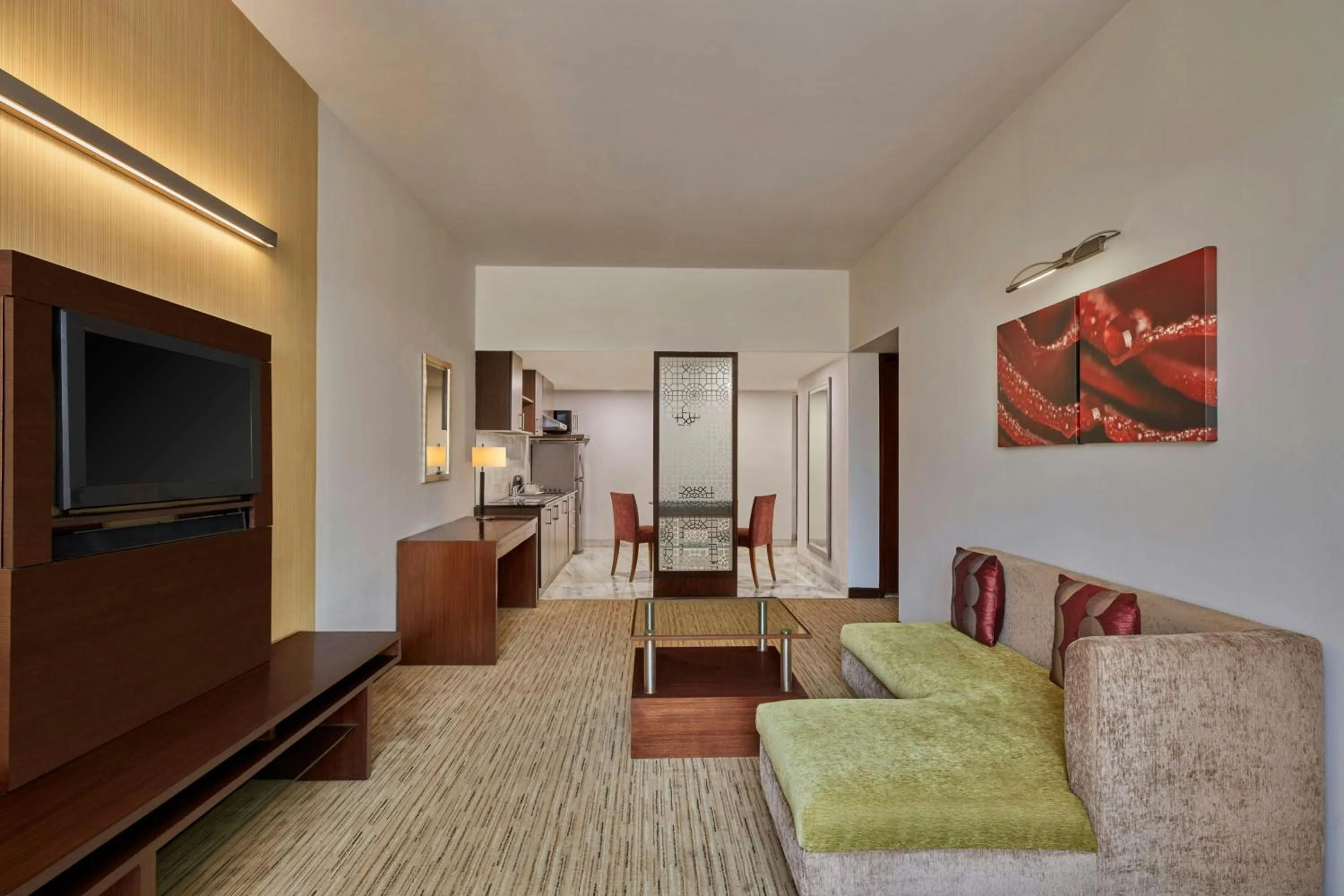 Living room, Bed in Four Points by Sheraton Hotel and Serviced Apartments Pune