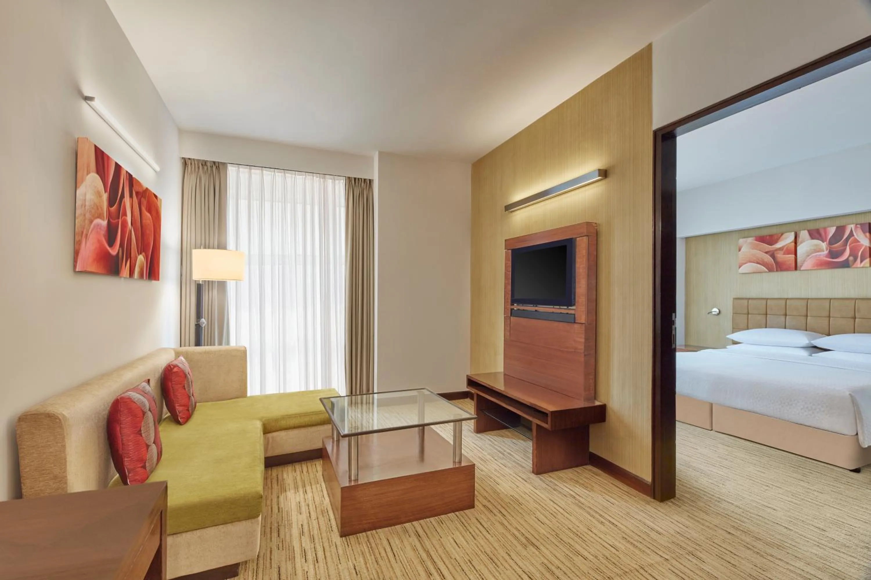 Communal lounge/ TV room, Bed in Four Points by Sheraton Hotel and Serviced Apartments Pune