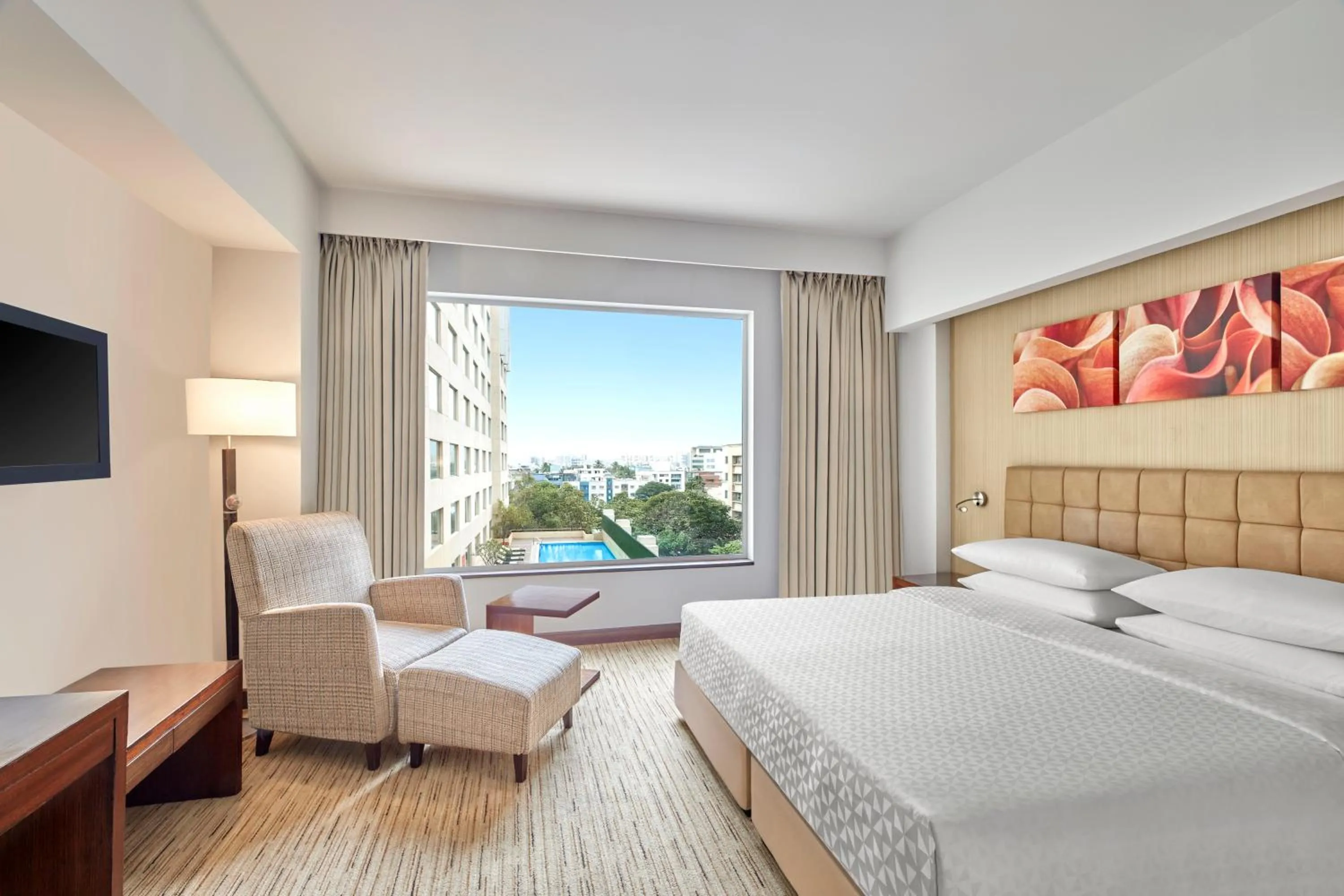 Bed in Four Points by Sheraton Hotel and Serviced Apartments Pune