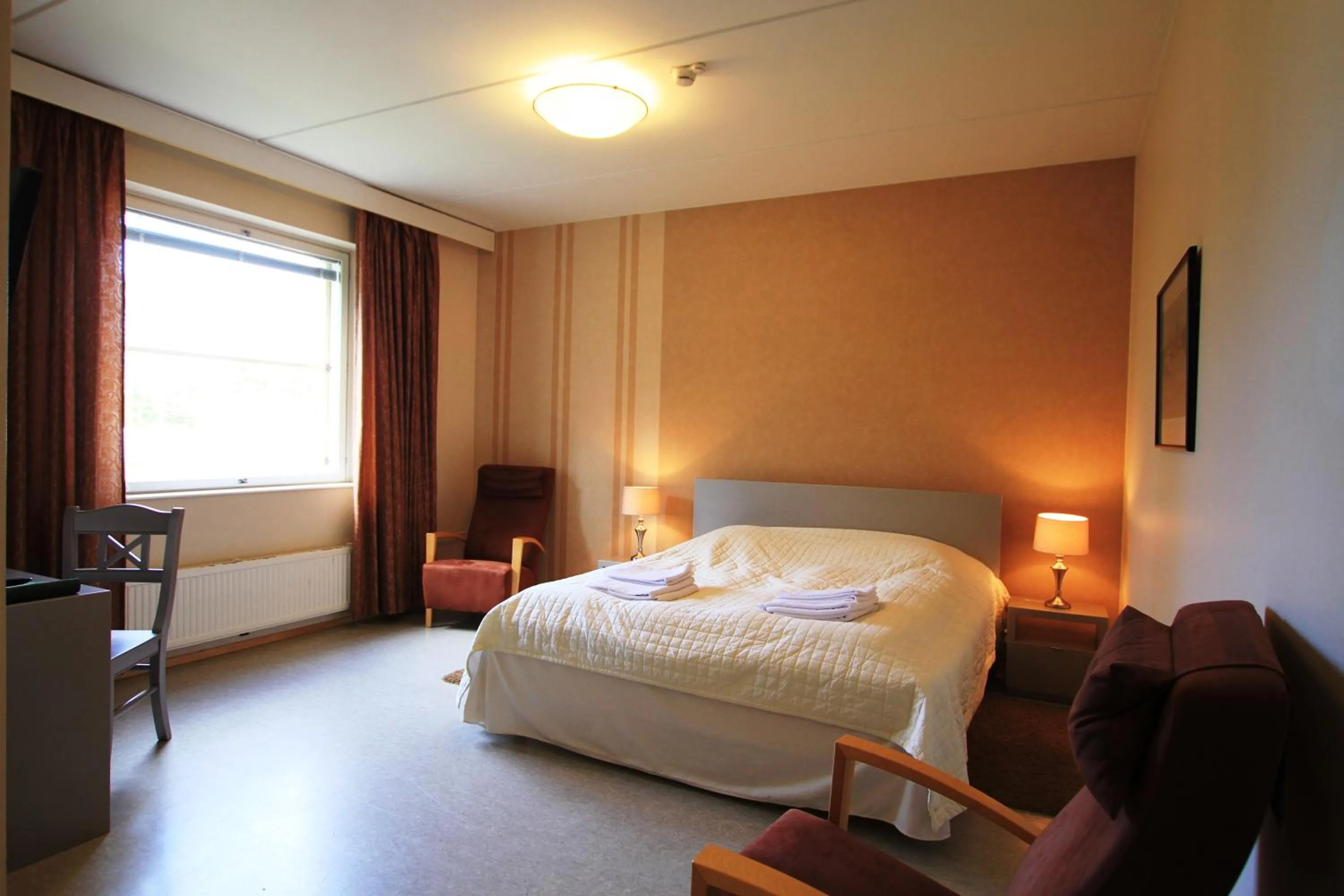 Photo of the whole room, Bed in Hotel Kruunupuisto