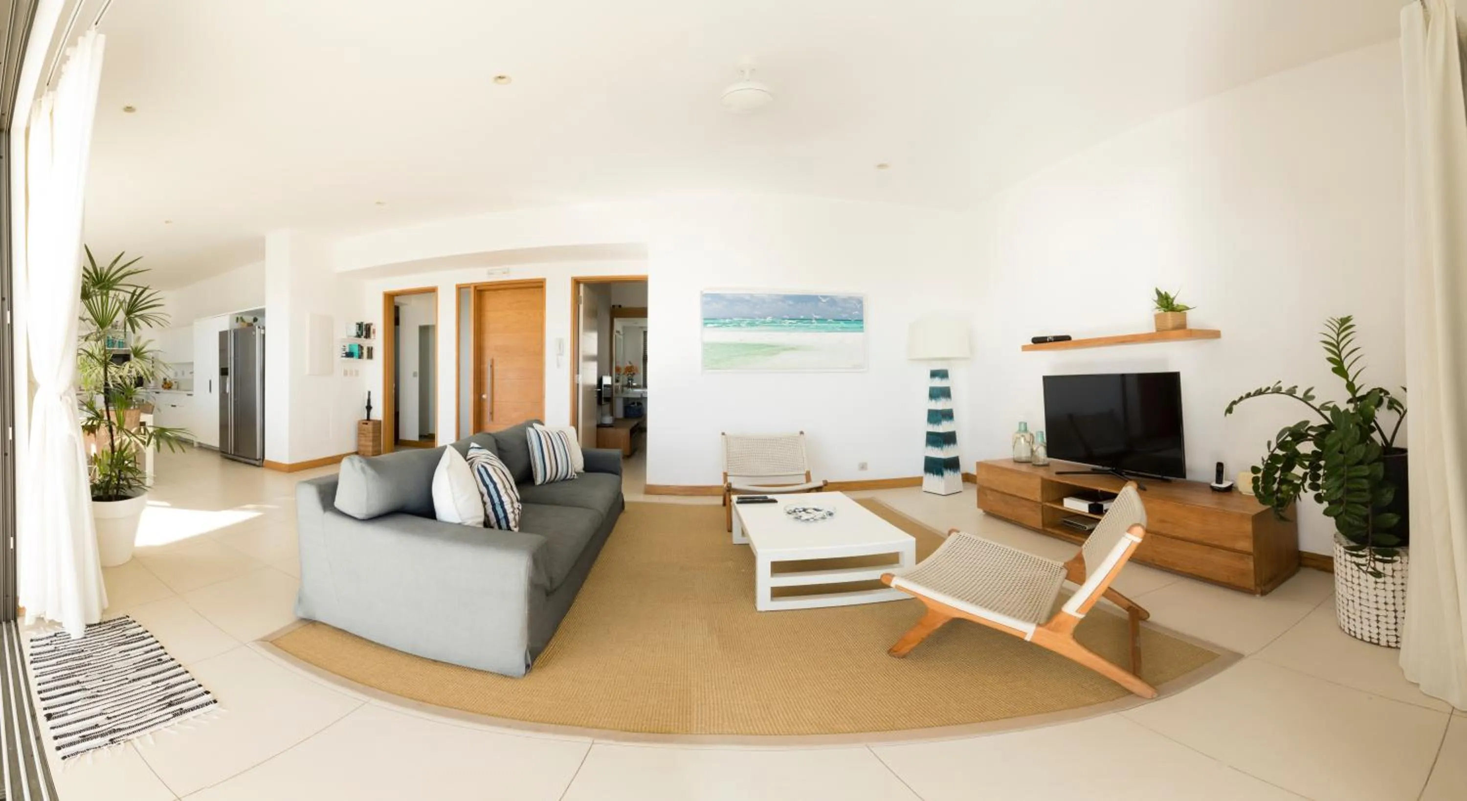 Communal lounge/ TV room in Open Sky Penthouse