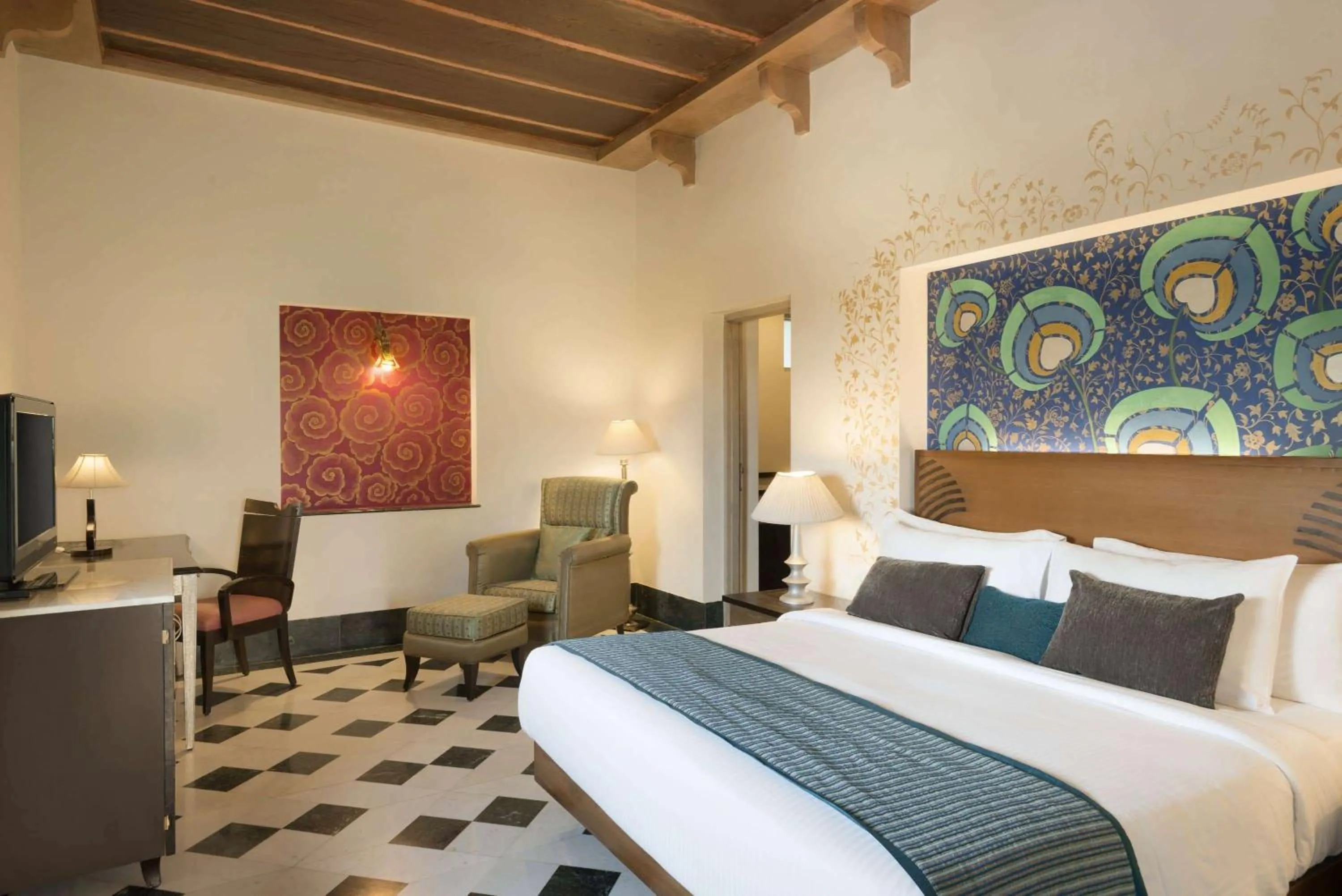 Bed in Ramada by Wyndham Udaipur Resort and Spa