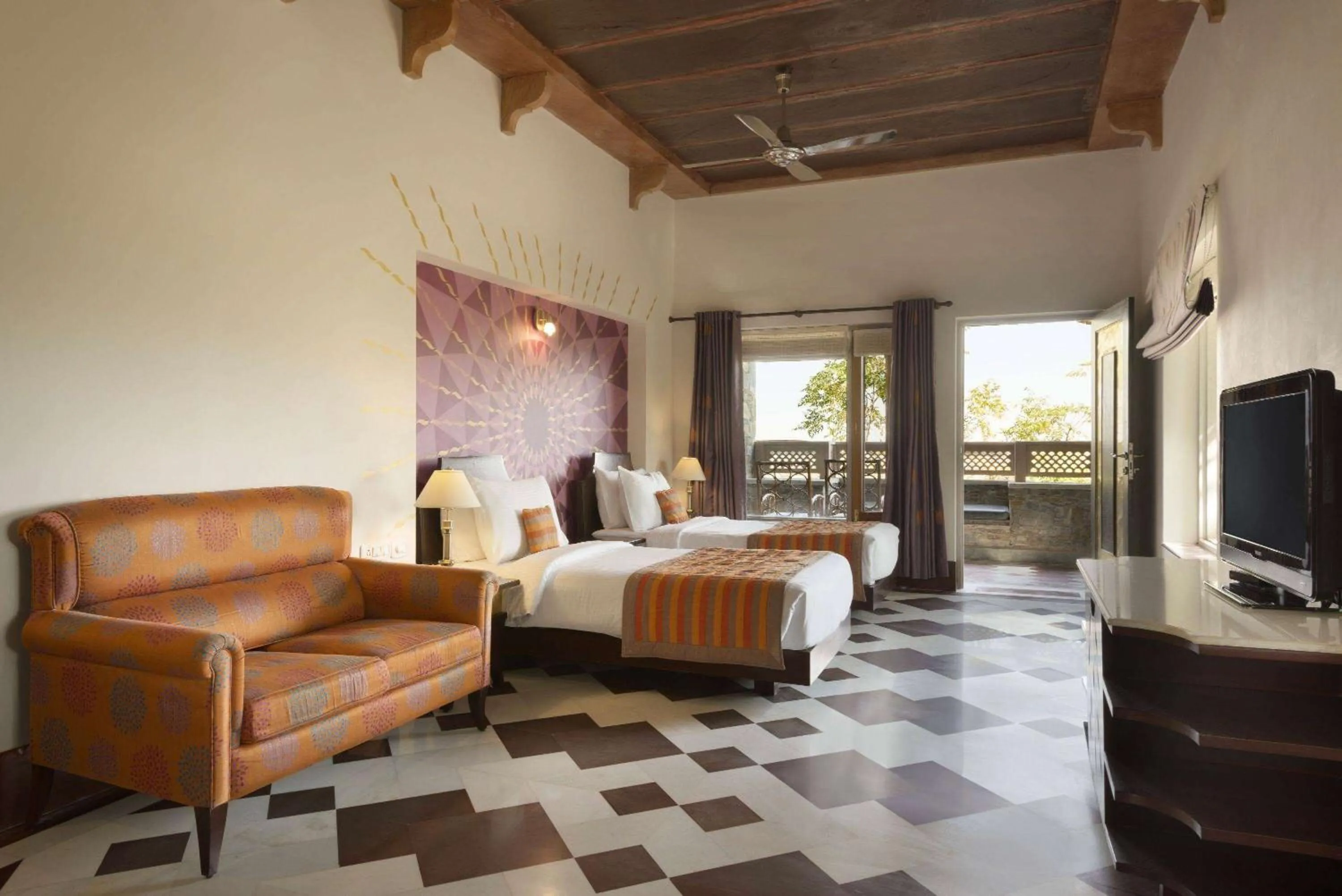 Photo of the whole room, Bed in Ramada by Wyndham Udaipur Resort and Spa