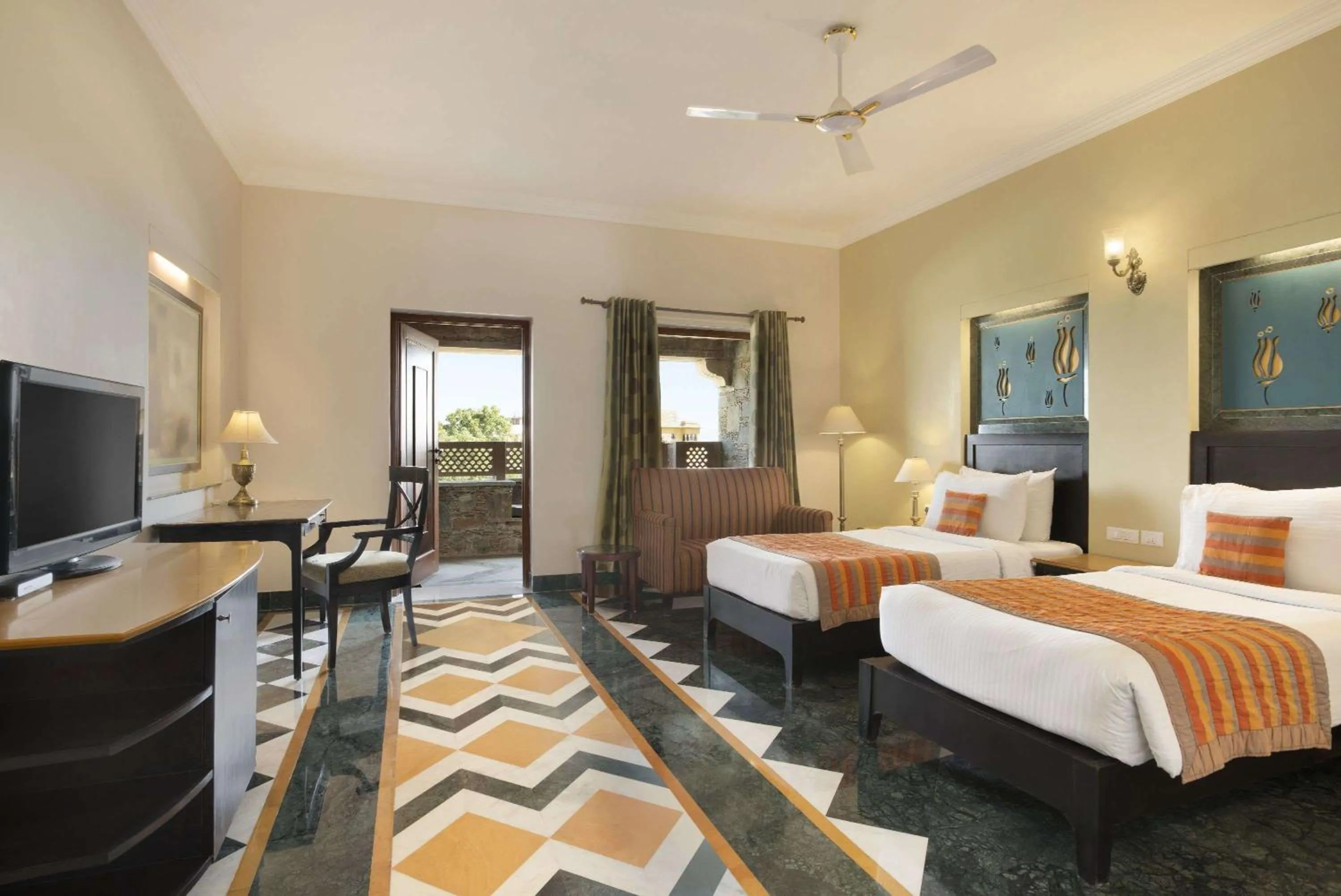 Photo of the whole room, Bed in Ramada by Wyndham Udaipur Resort and Spa