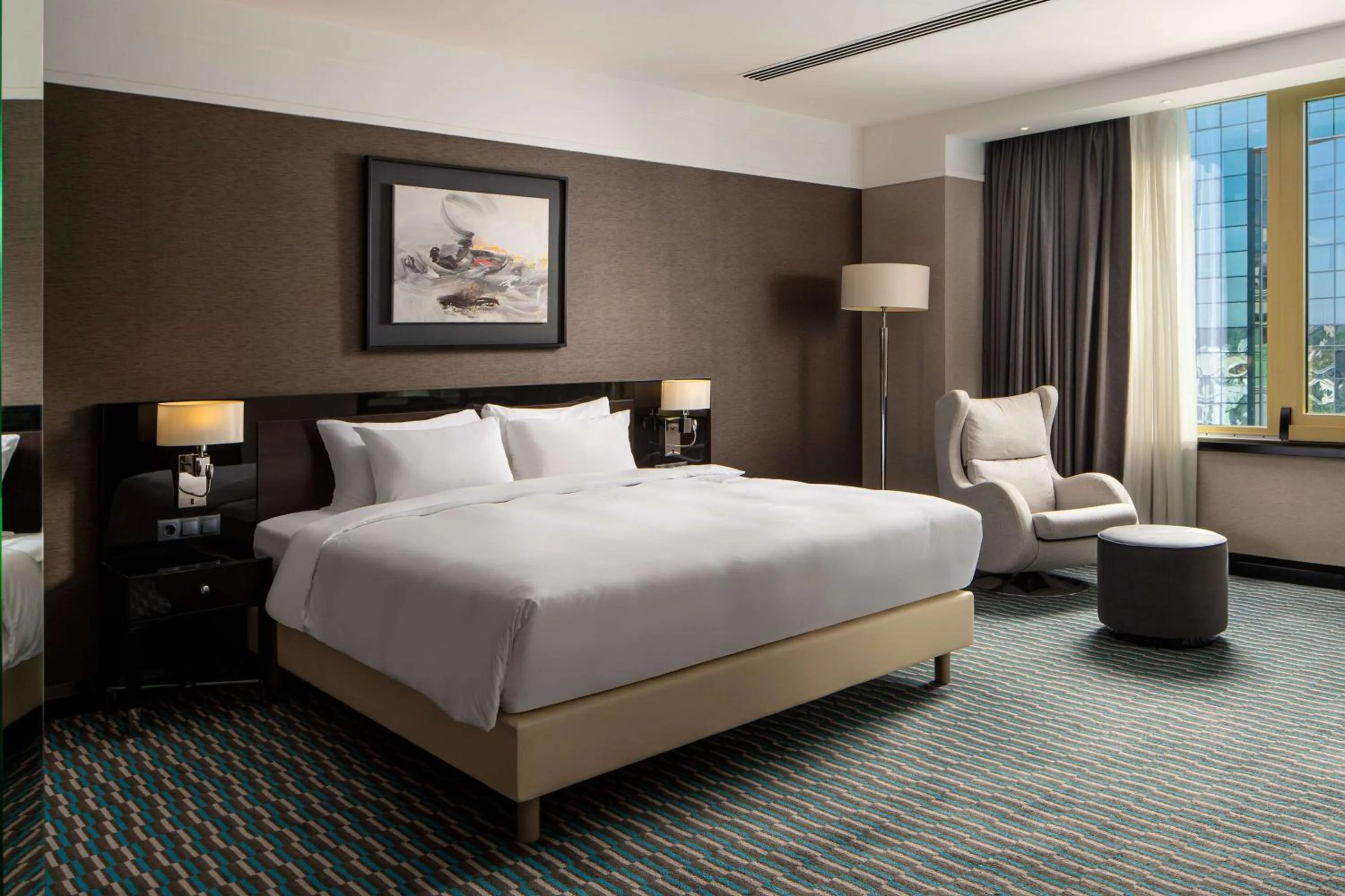 Photo of the whole room, Bed in Radisson Blu Leogrand Hotel