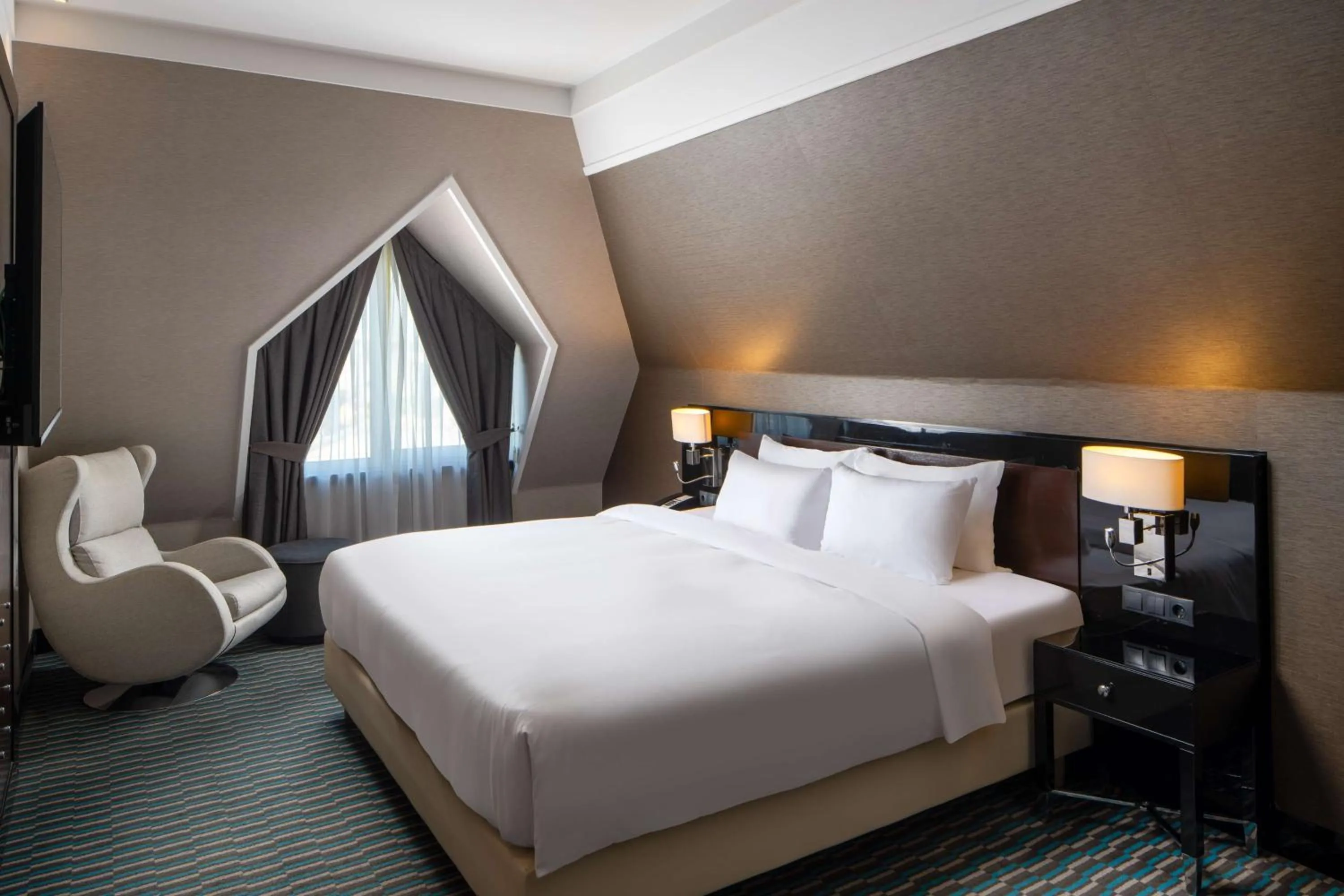 Photo of the whole room, Bed in Radisson Blu Leogrand Hotel