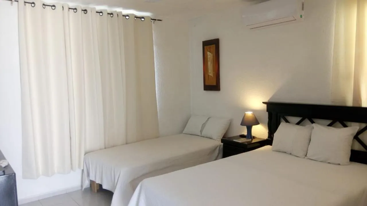 Bed in HOSPEDAJE HOLY