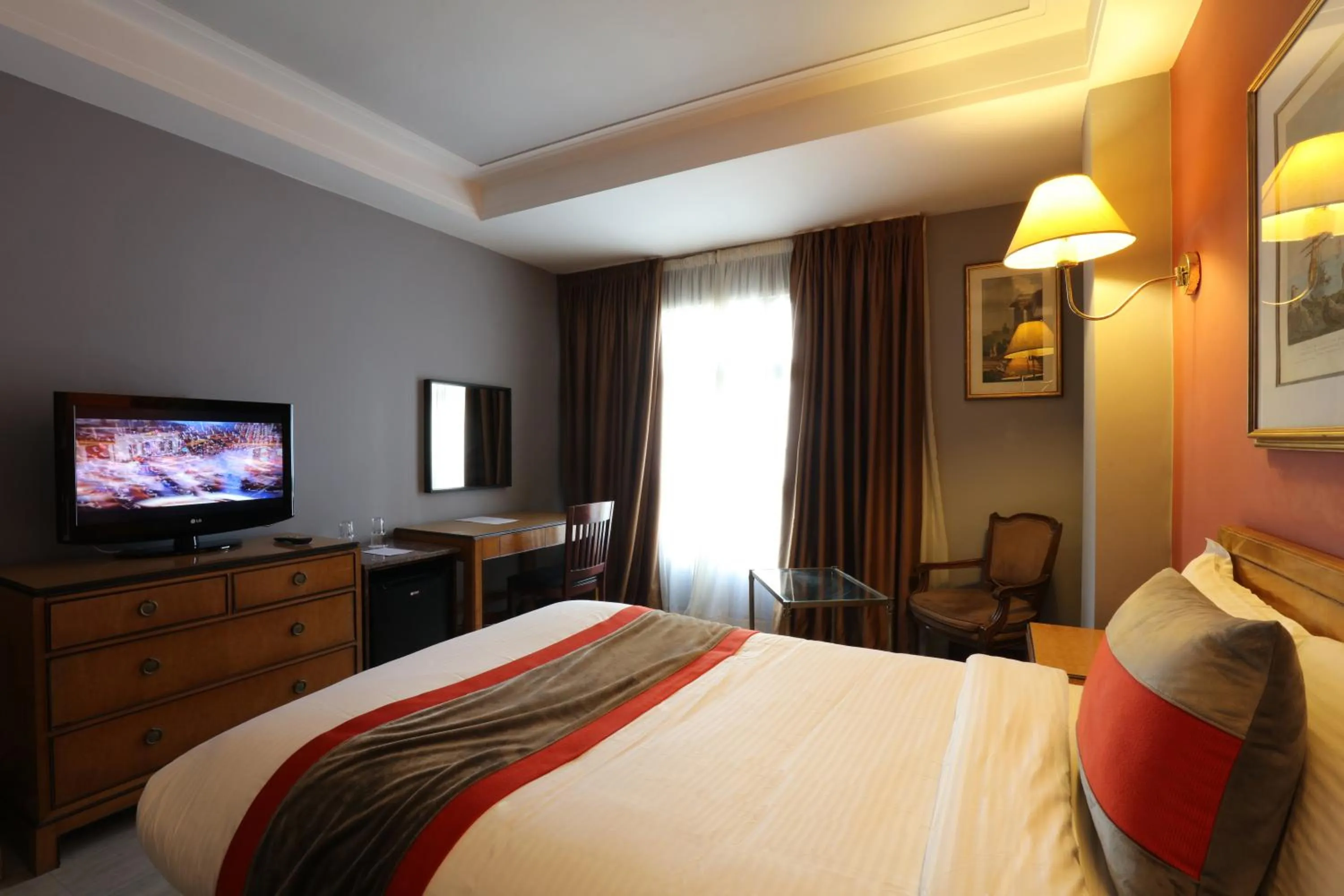 Bed in Hôtel Les Saisons