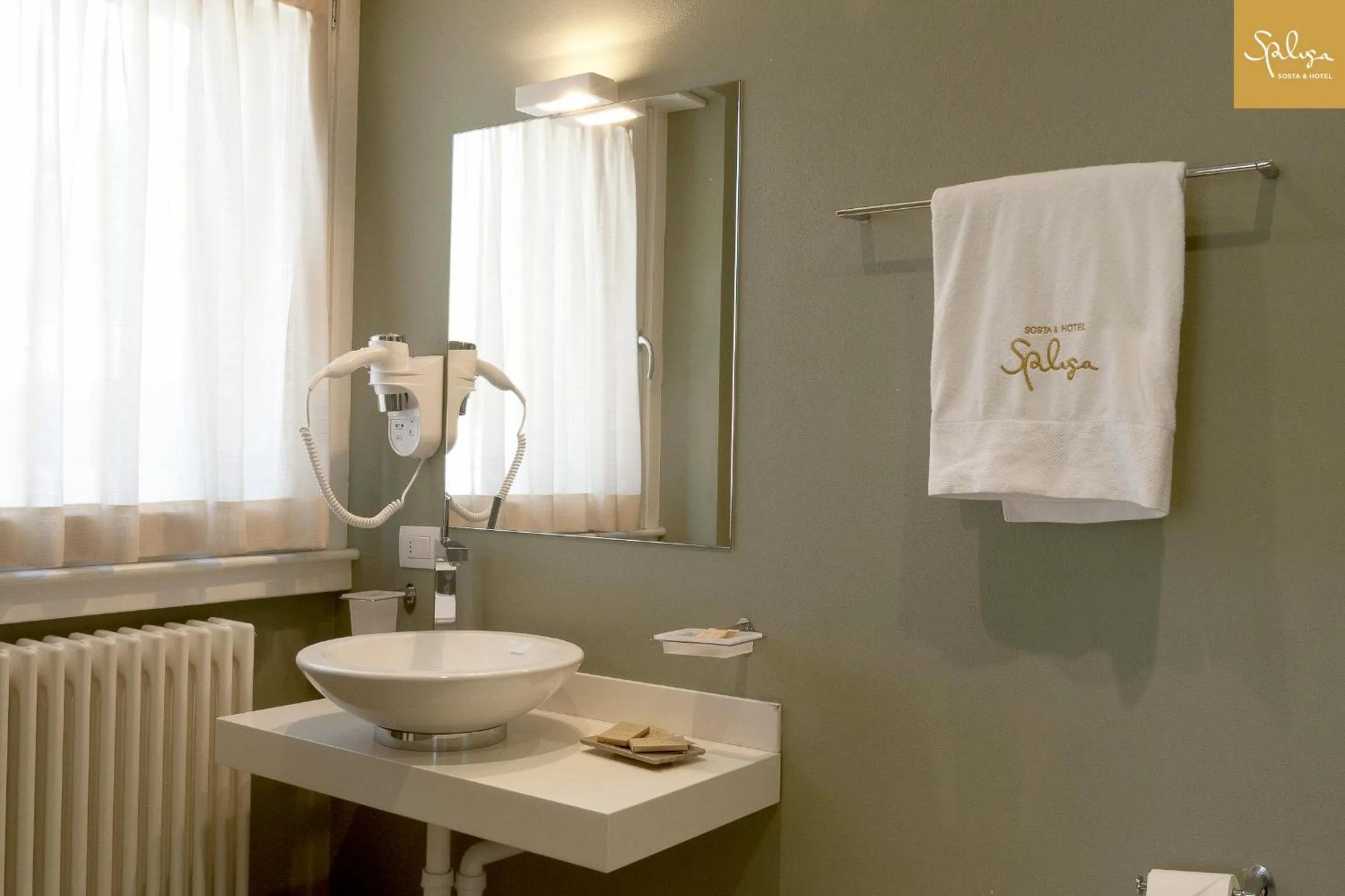 Property logo or sign in Spluga Sosta & Hotel