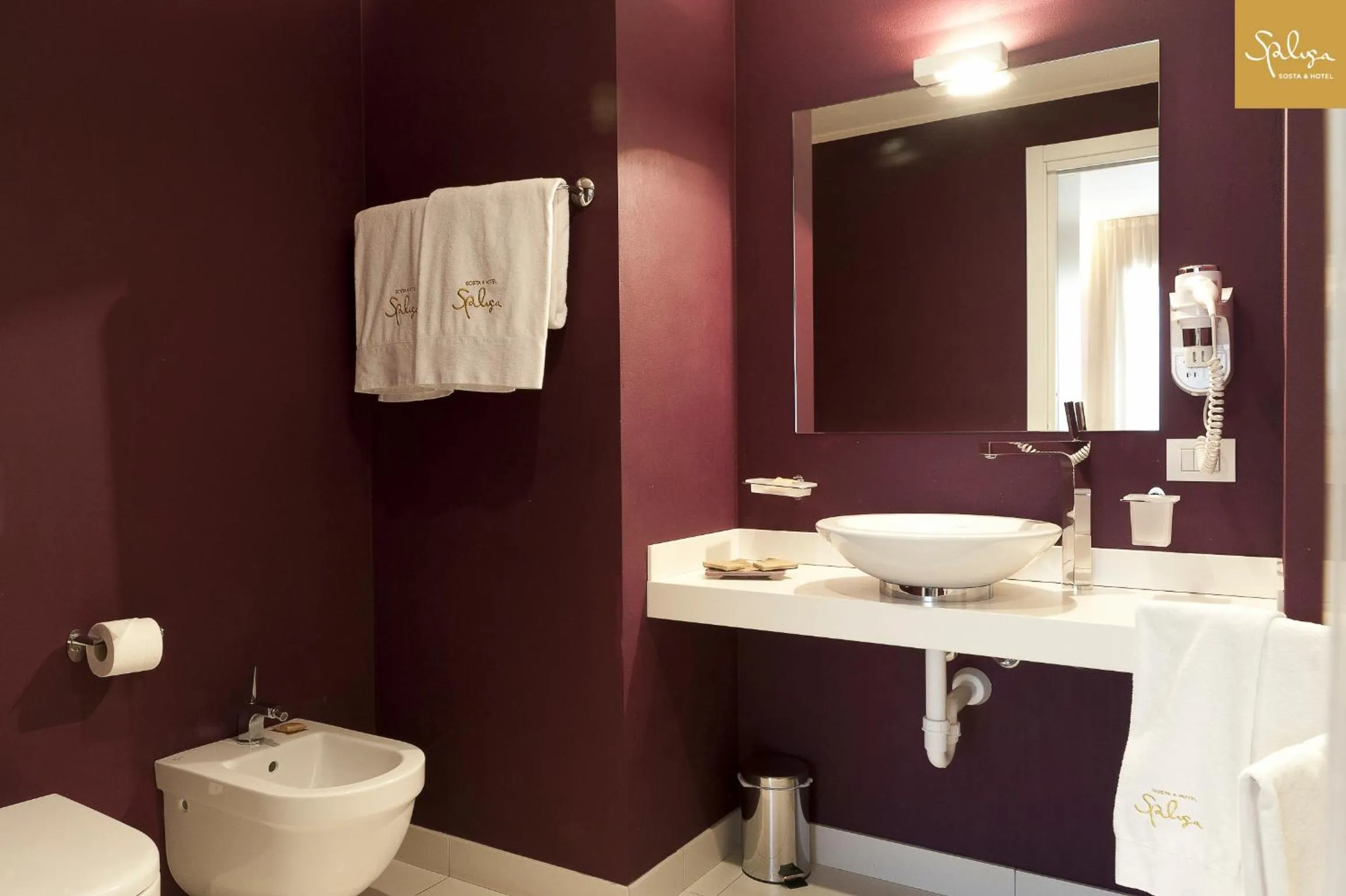 Property logo or sign in Spluga Sosta & Hotel