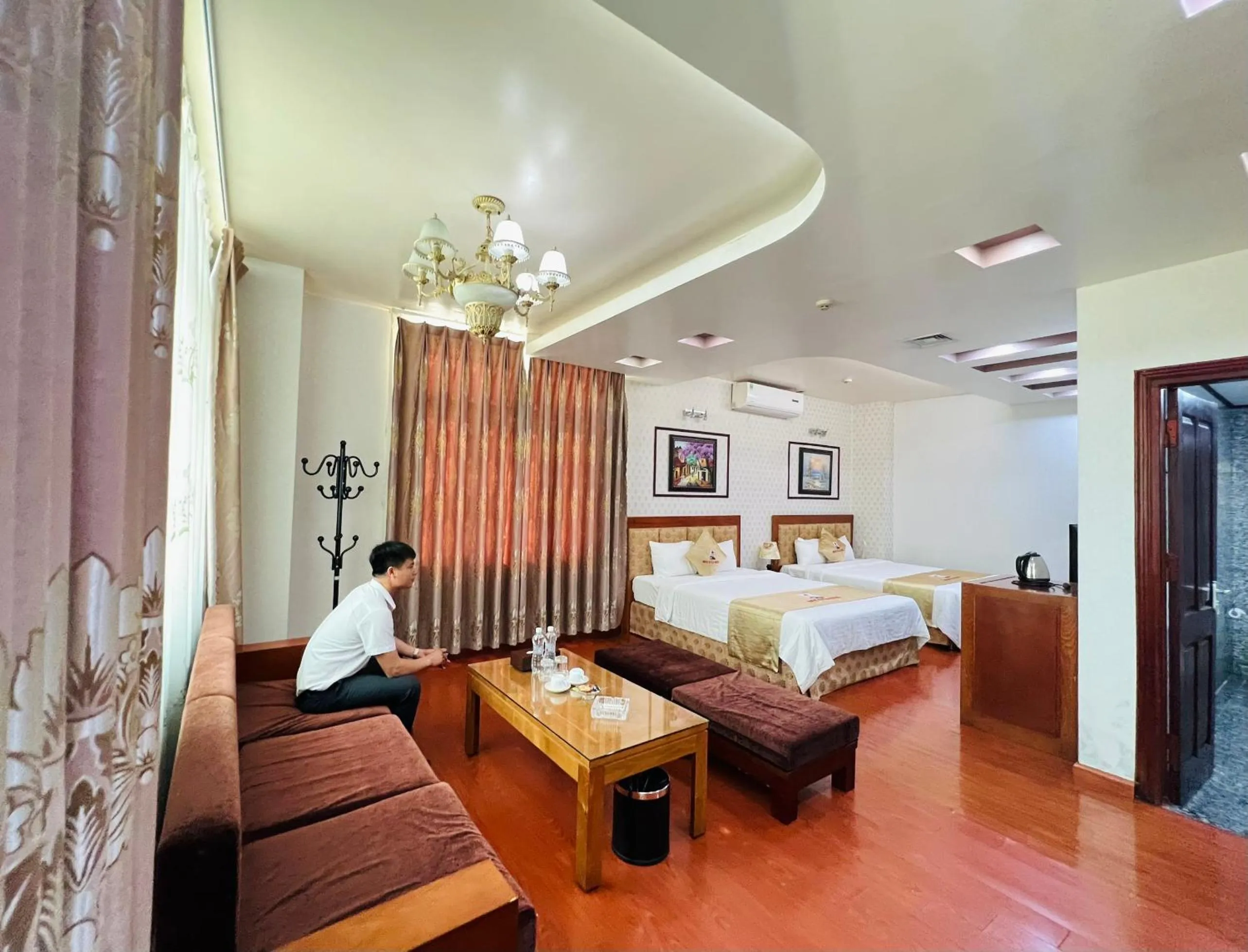 Seating area, Bed in Khách sạn INCO 515.9