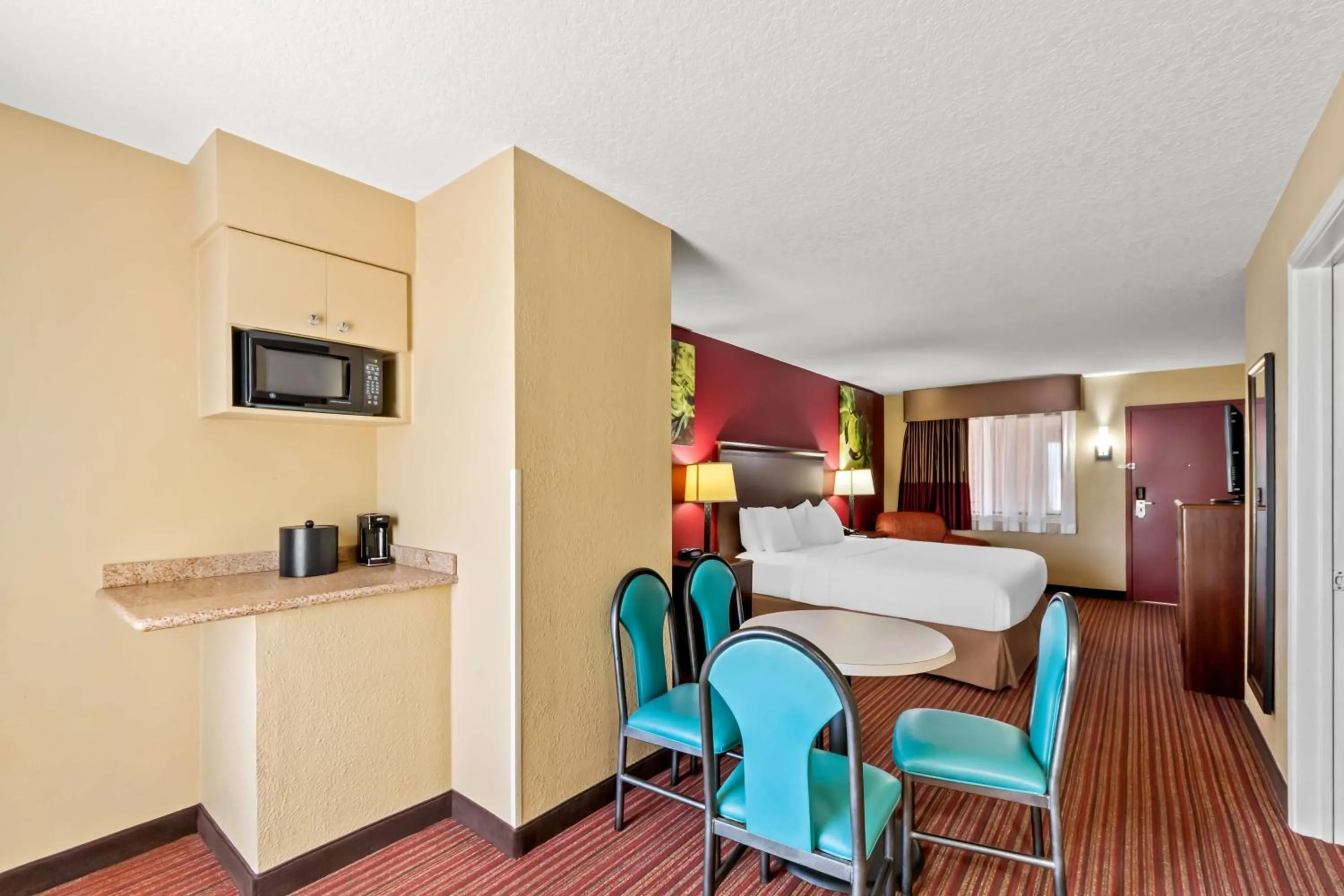Bedroom in SureStay Plus by Best Western San Antonio Fiesta Inn
