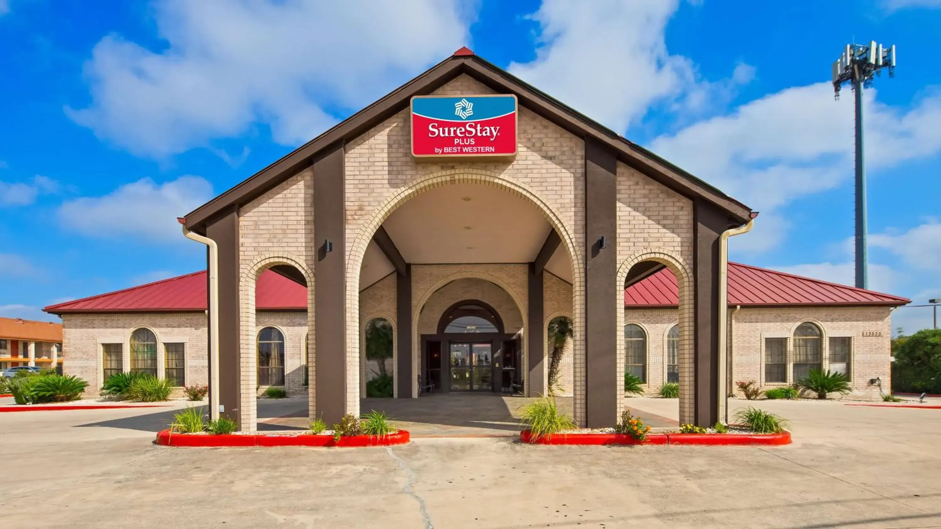 Property building in SureStay Plus by Best Western San Antonio Fiesta Inn Property building in SureStay Plus by Best Western San Antonio Fiesta Inn