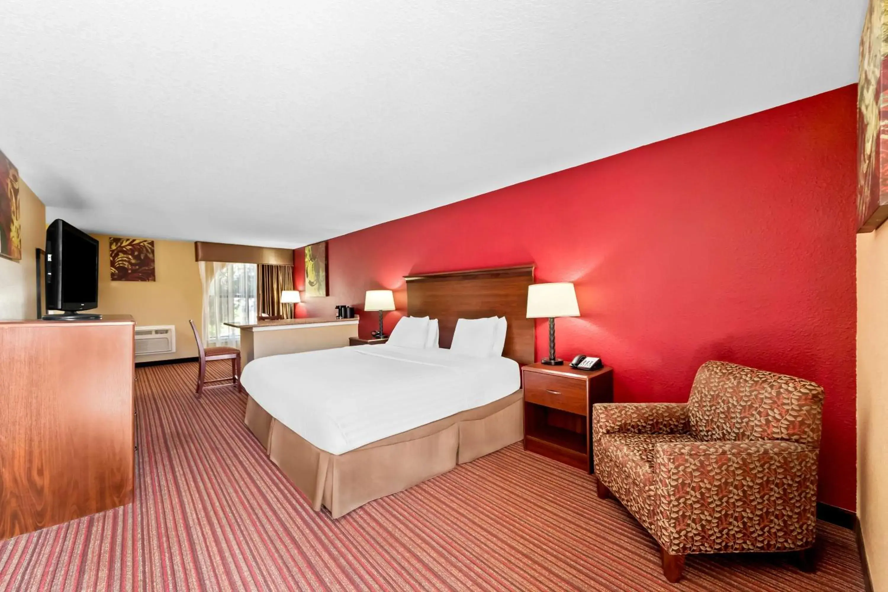 Bedroom, Bed in SureStay Plus by Best Western San Antonio Fiesta Inn Bedroom, Bed in SureStay Plus by Best Western San Antonio Fiesta Inn