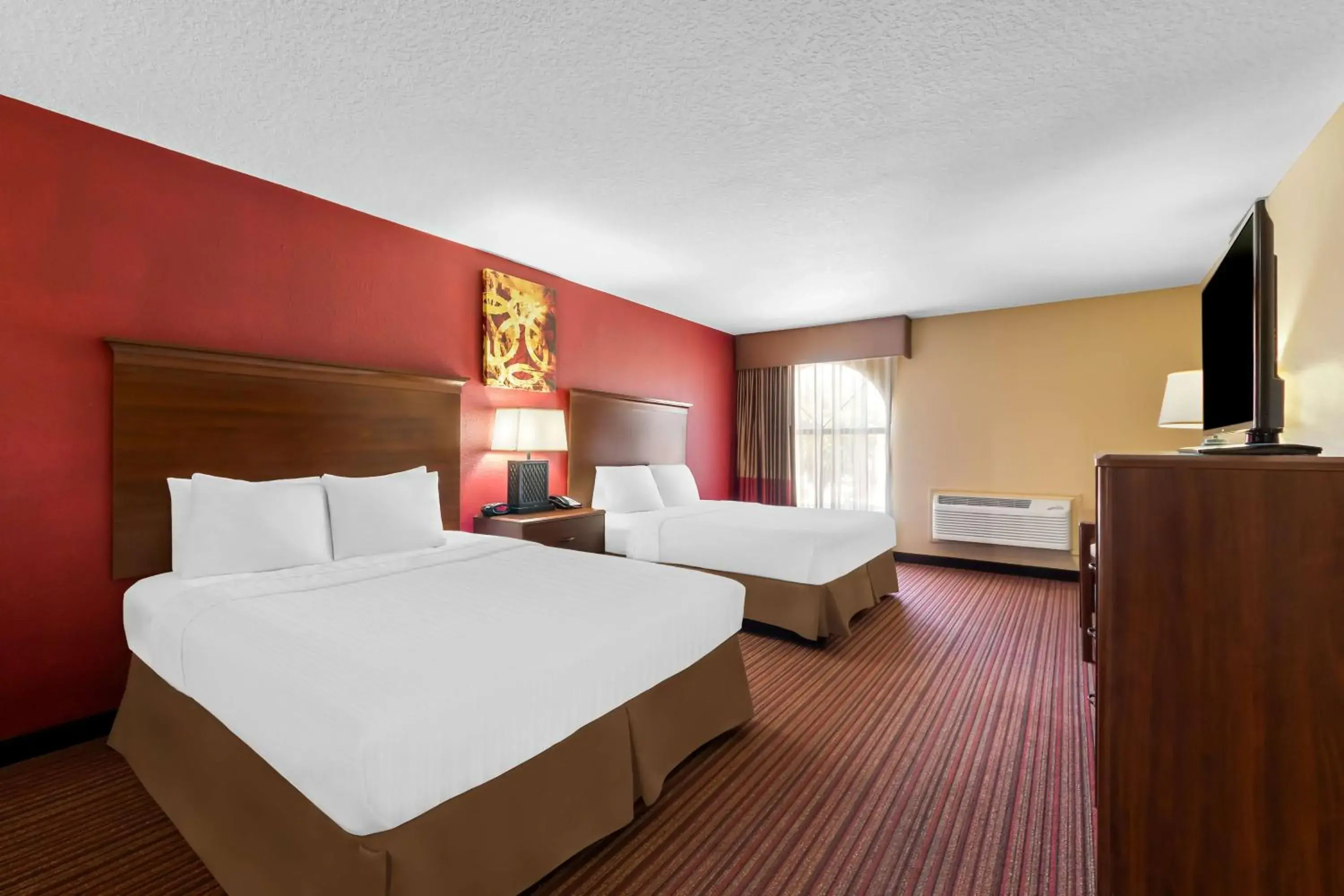 Bedroom, Bed in SureStay Plus by Best Western San Antonio Fiesta Inn Bedroom, Bed in SureStay Plus by Best Western San Antonio Fiesta Inn
