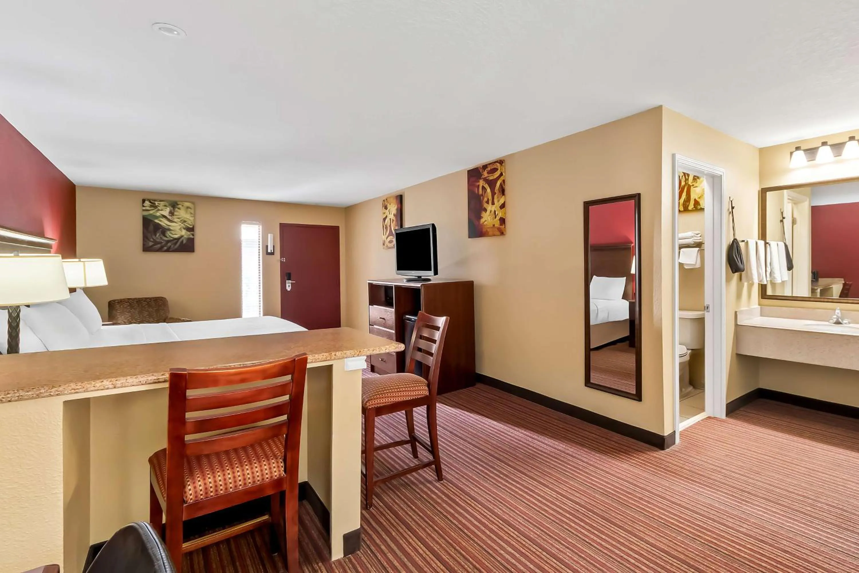 Bedroom in SureStay Plus by Best Western San Antonio Fiesta Inn