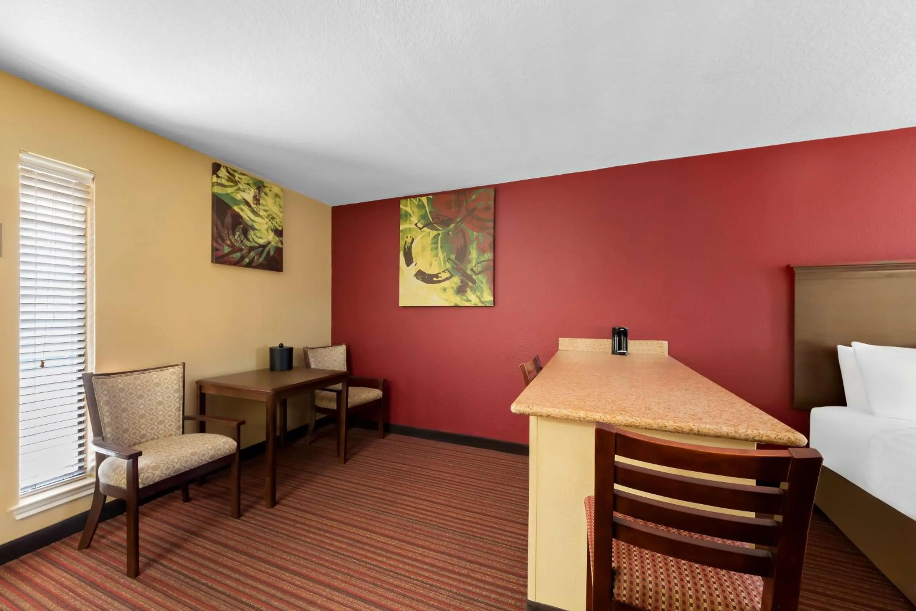 Bedroom in SureStay Plus by Best Western San Antonio Fiesta Inn