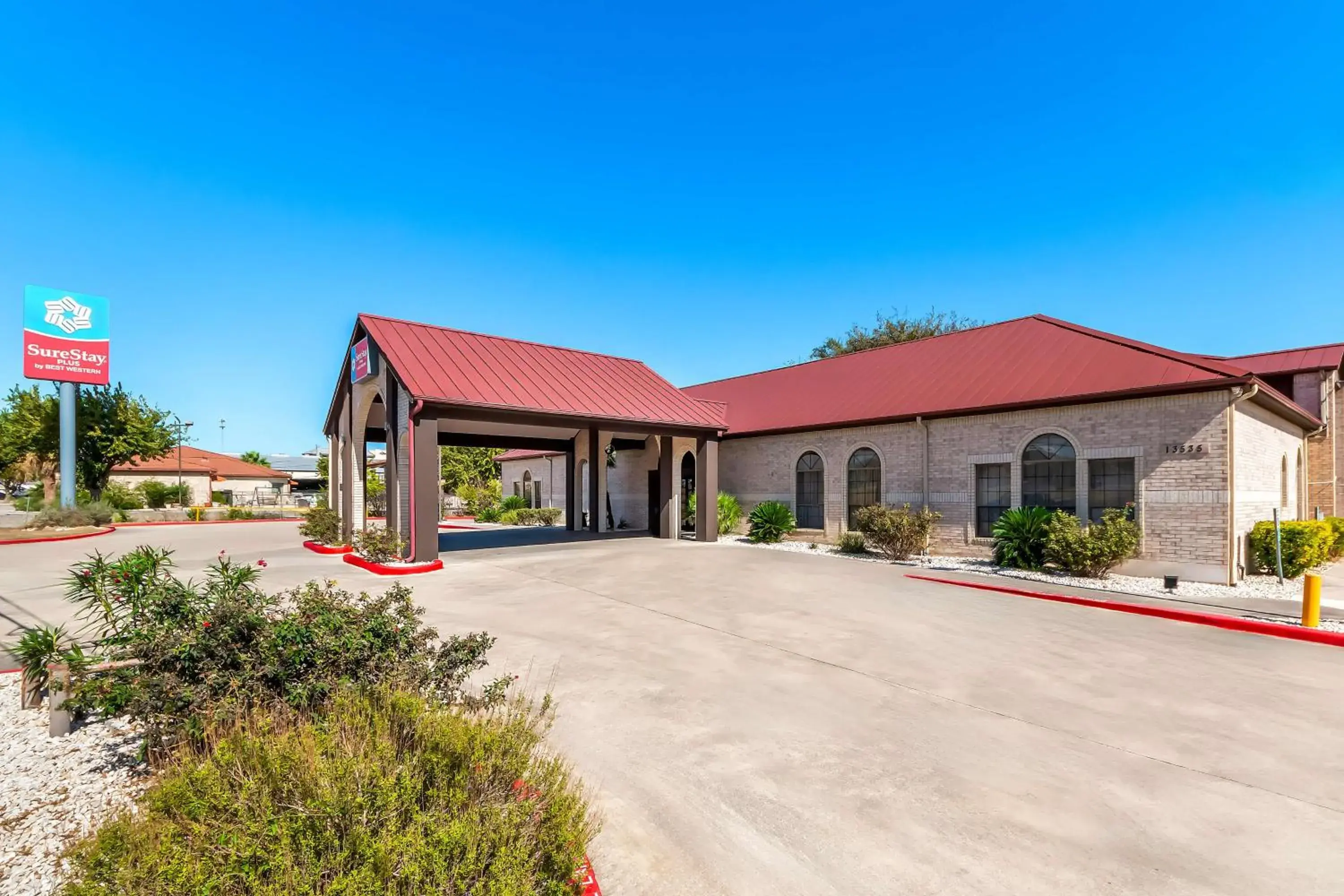 Property building in SureStay Plus by Best Western San Antonio Fiesta Inn Property building in SureStay Plus by Best Western San Antonio Fiesta Inn