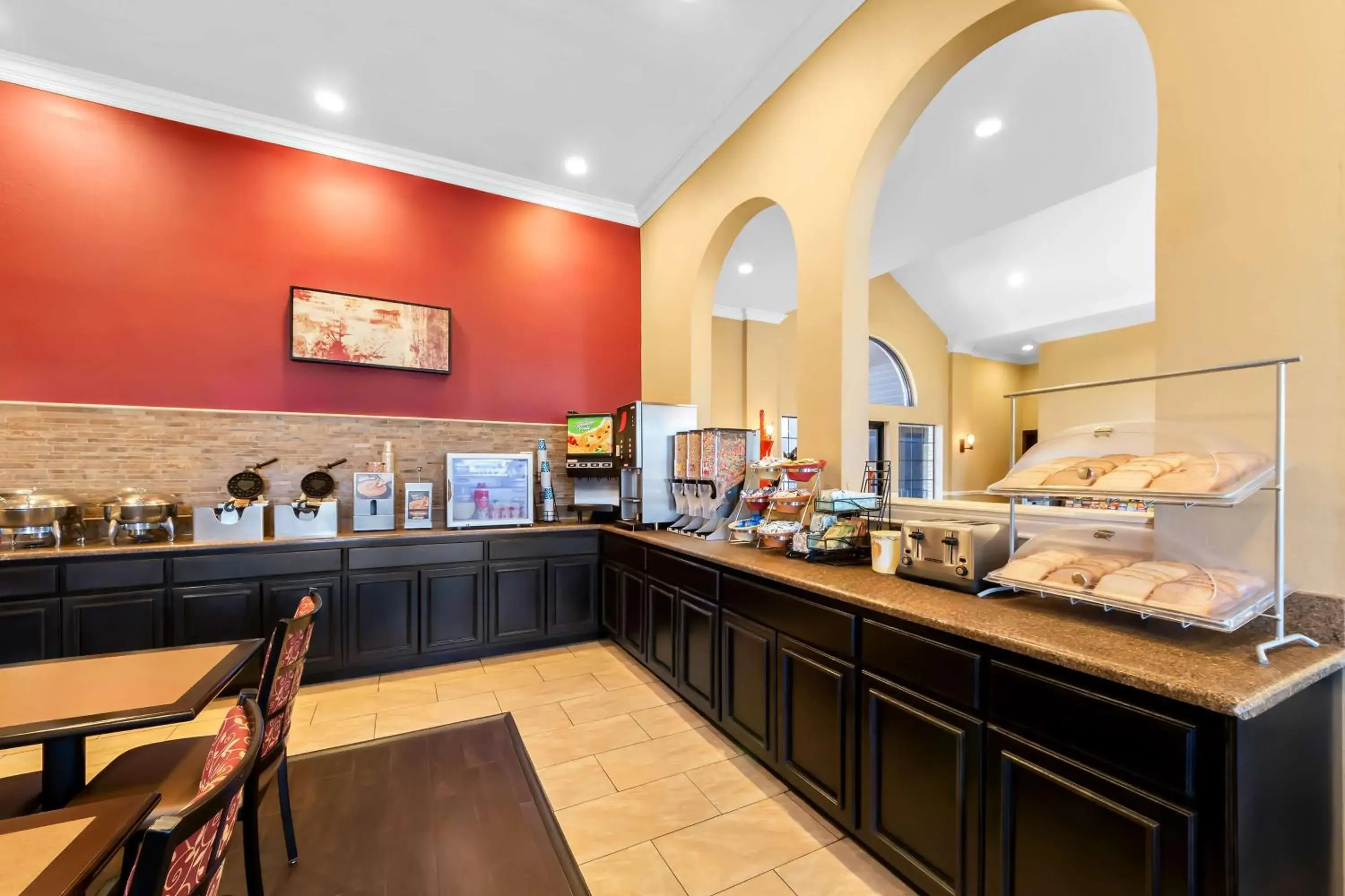 Breakfast in SureStay Plus by Best Western San Antonio Fiesta Inn Breakfast in SureStay Plus by Best Western San Antonio Fiesta Inn