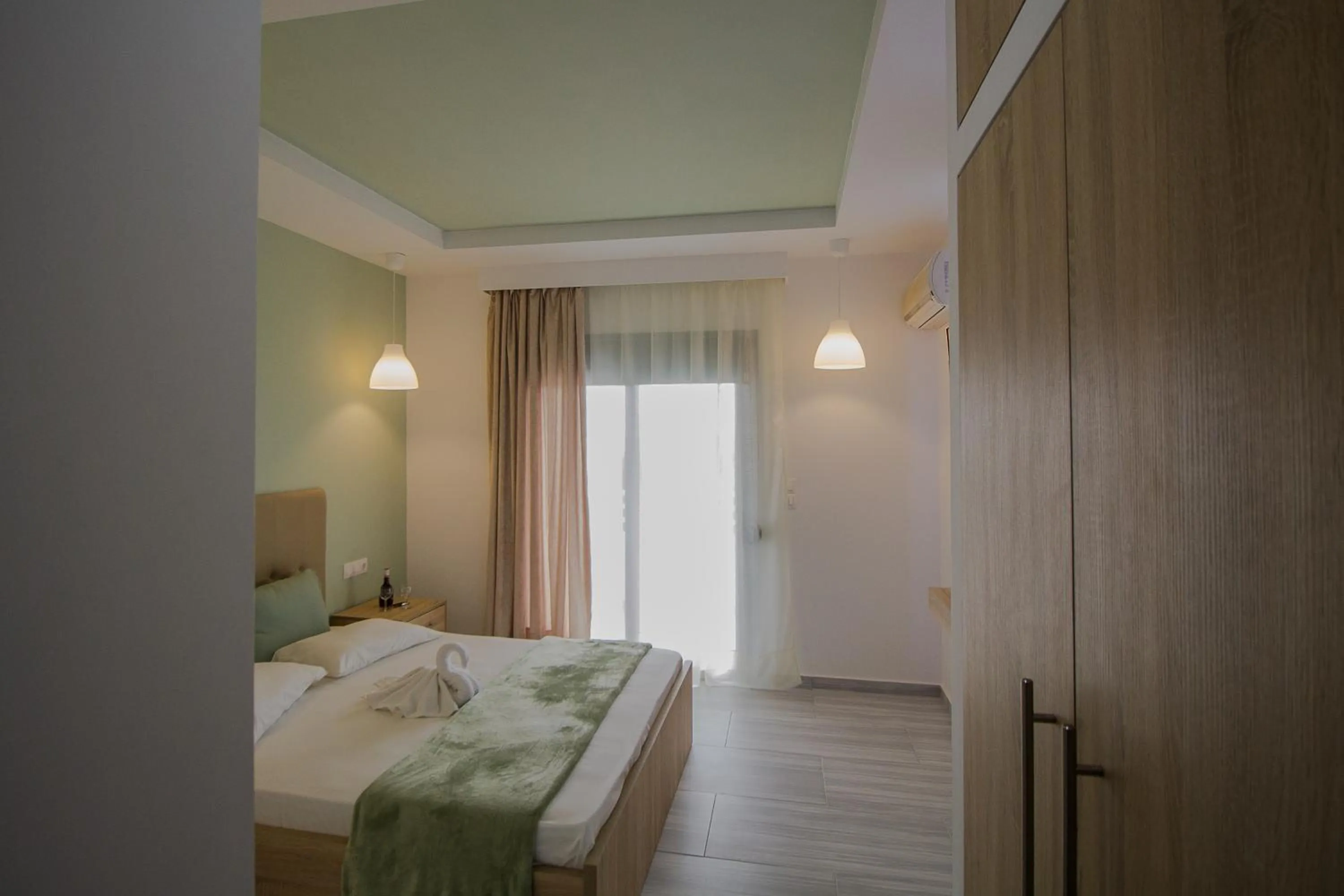 Photo of the whole room, Bed in Maroula Studios