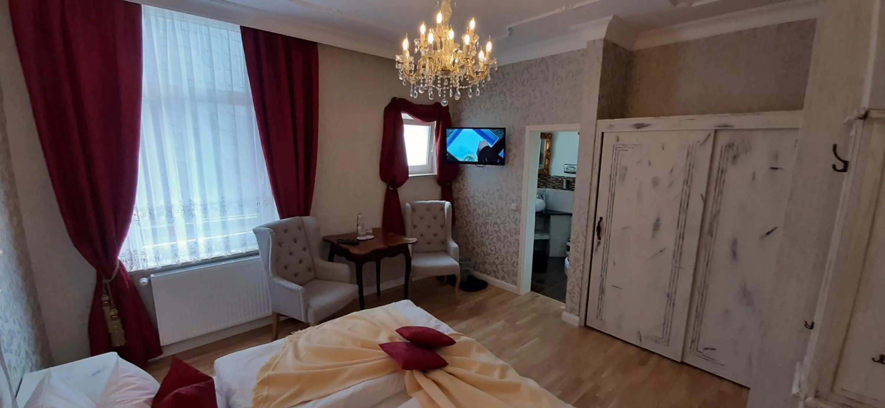 Photo of the whole room, Bed in Stadtparkhotel Alexandra