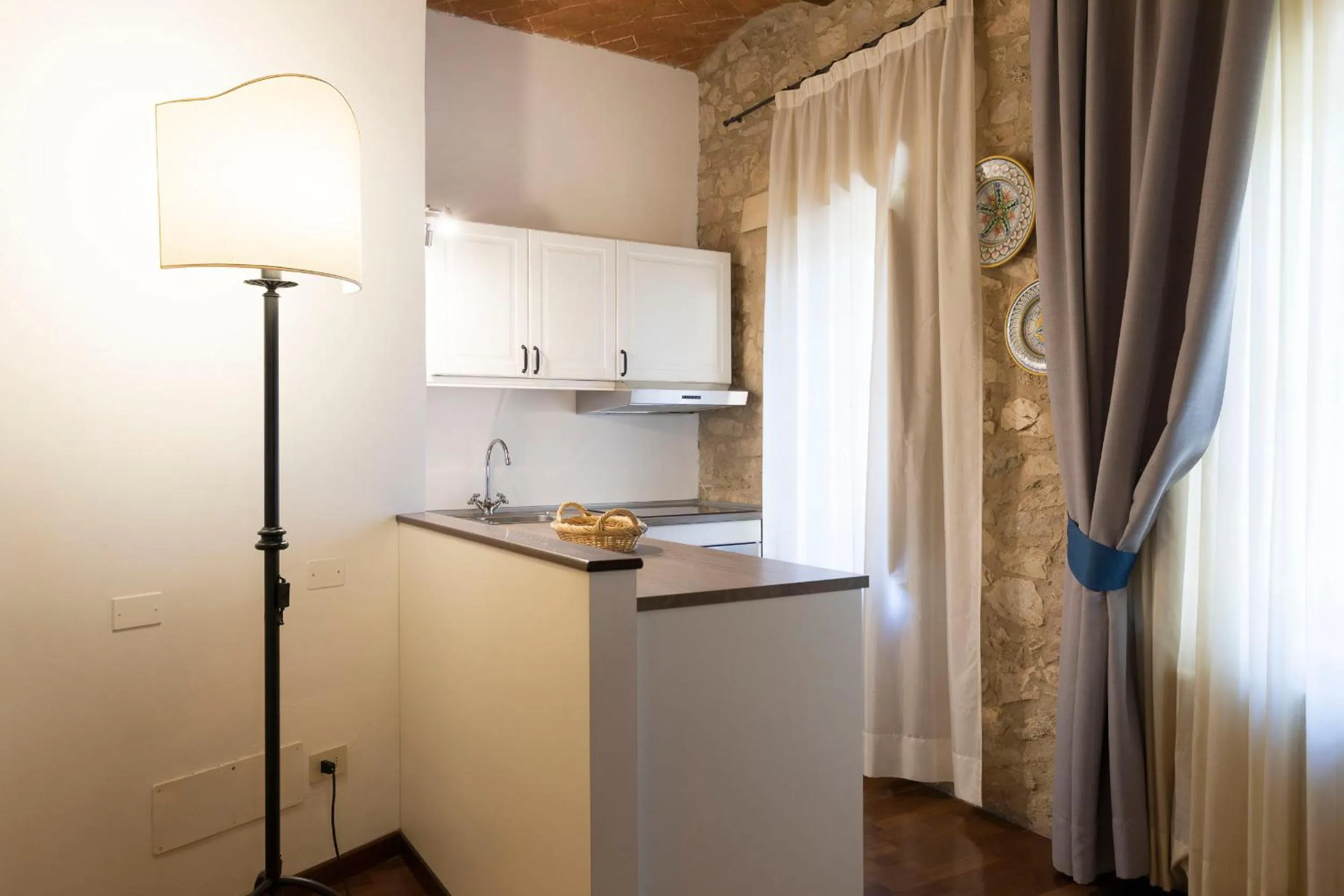 Kitchen or kitchenette in Borgo Il Poggiaccio Residenza Turistico Alberghiera