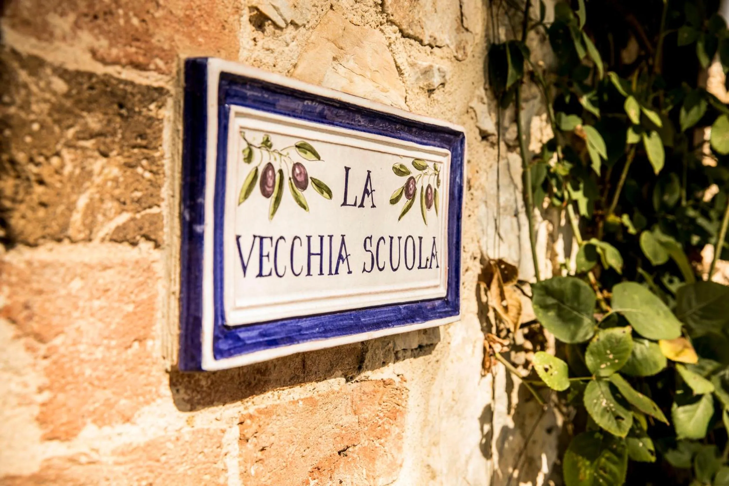 Property logo or sign in Borgo Il Poggiaccio Residenza Turistico Alberghiera