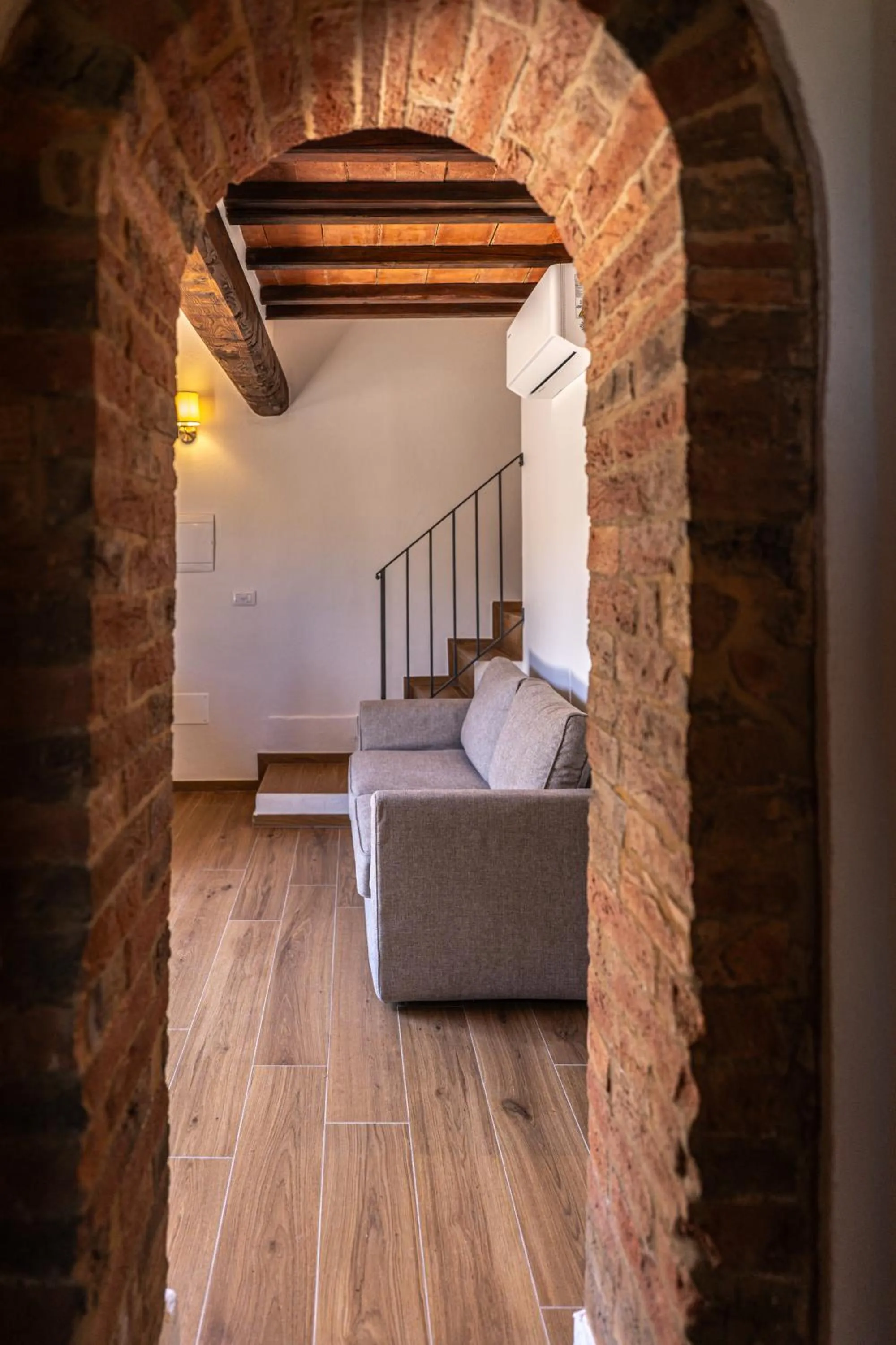 Living room, Bed in Borgo Il Poggiaccio Residenza Turistico Alberghiera