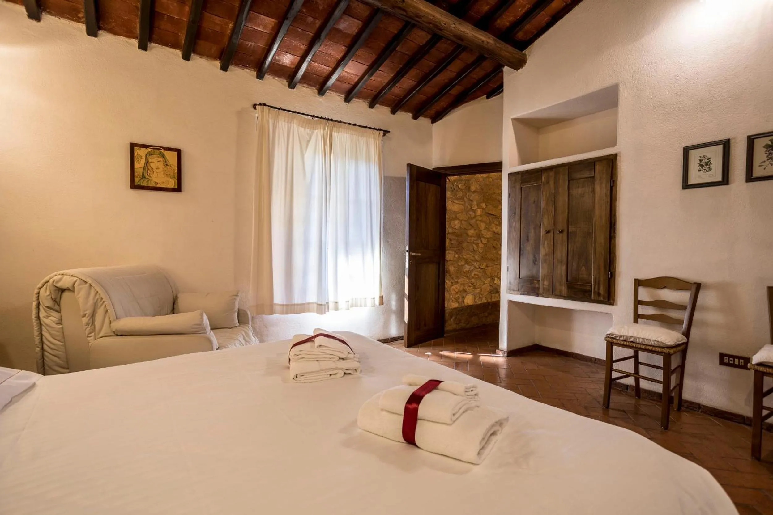 Photo of the whole room, Bed in Borgo Il Poggiaccio Residenza Turistico Alberghiera
