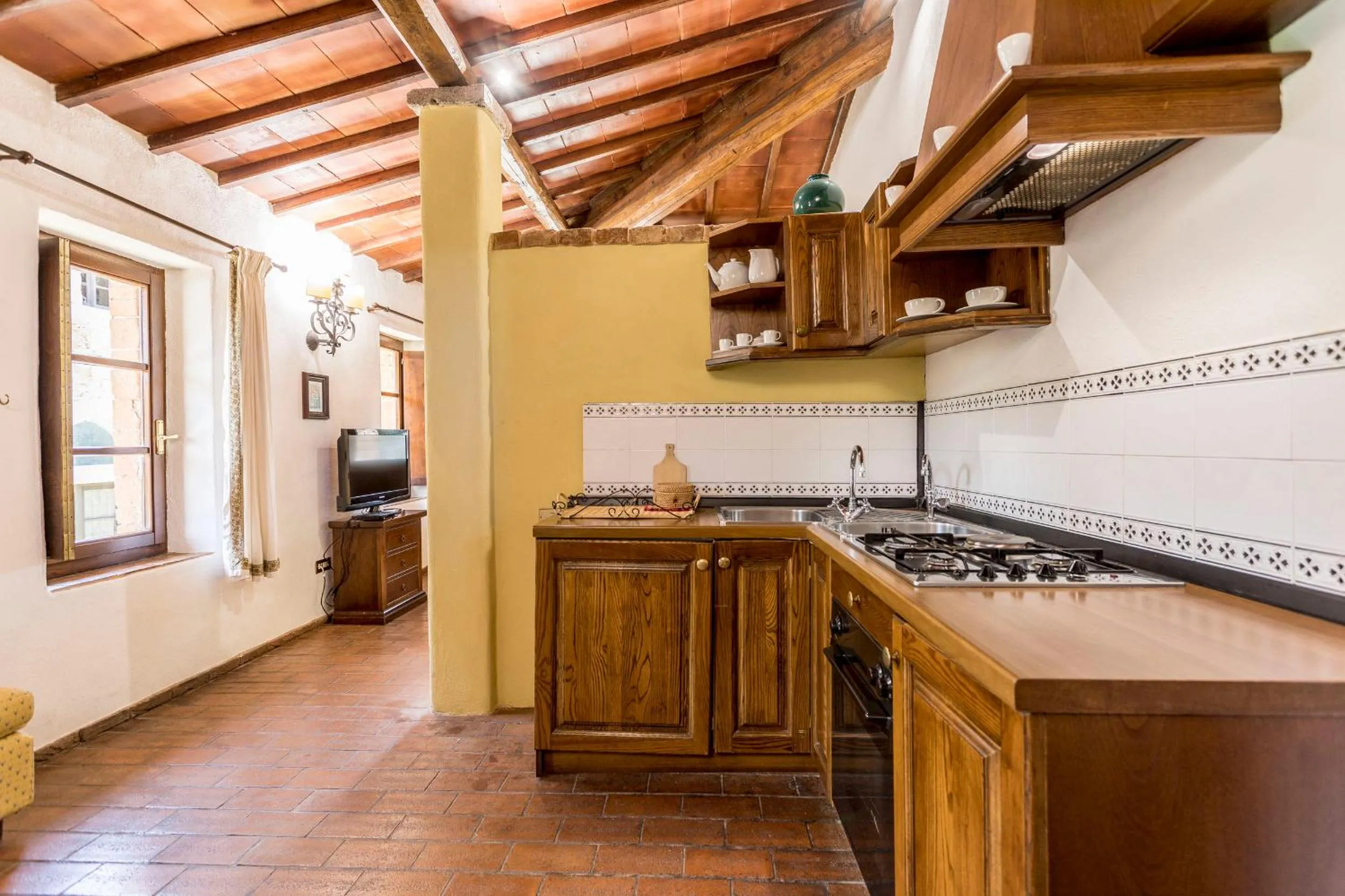 Kitchen or kitchenette in Borgo Il Poggiaccio Residenza Turistico Alberghiera