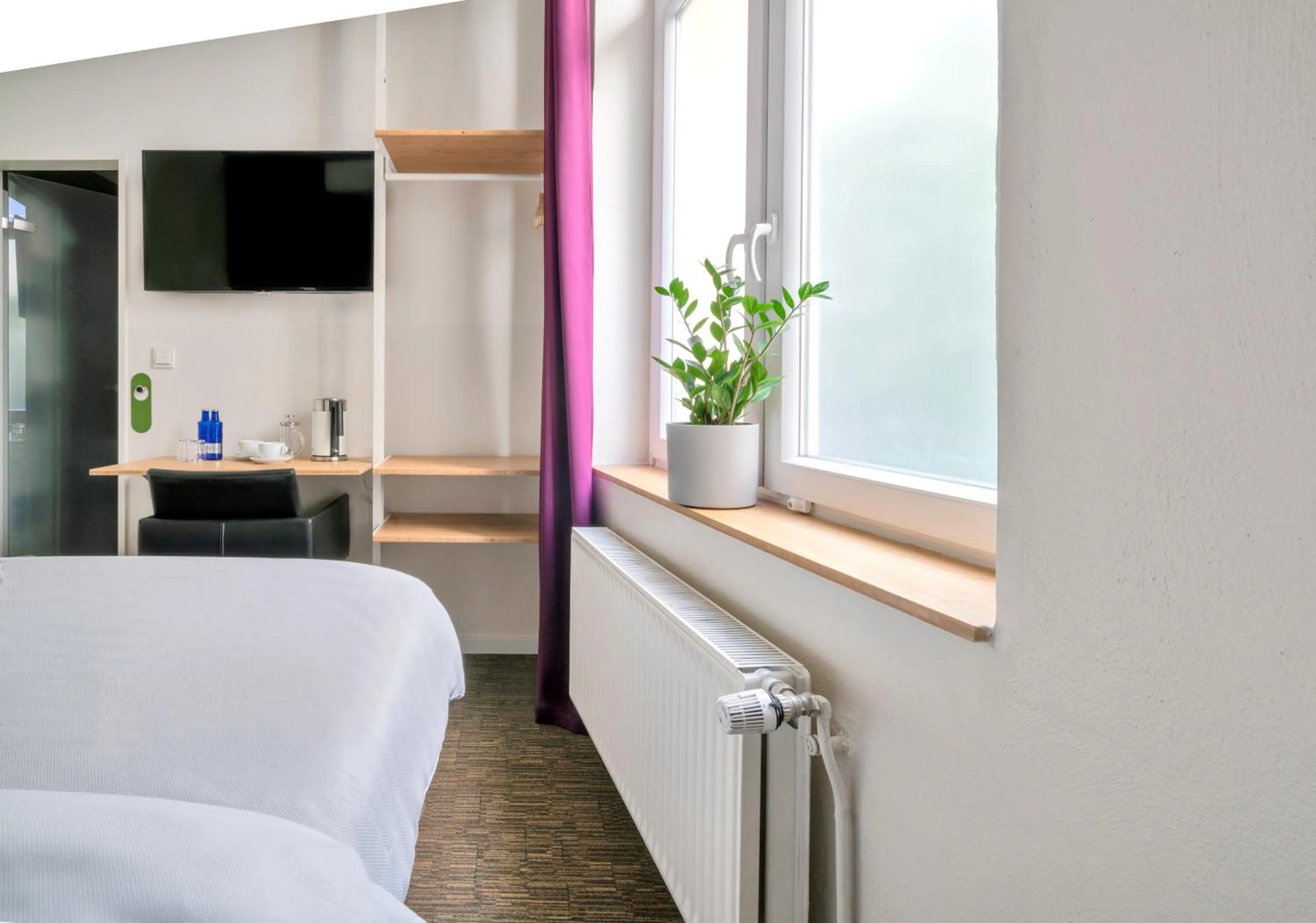 TV and multimedia, Bed in Design Hotel Wiegand