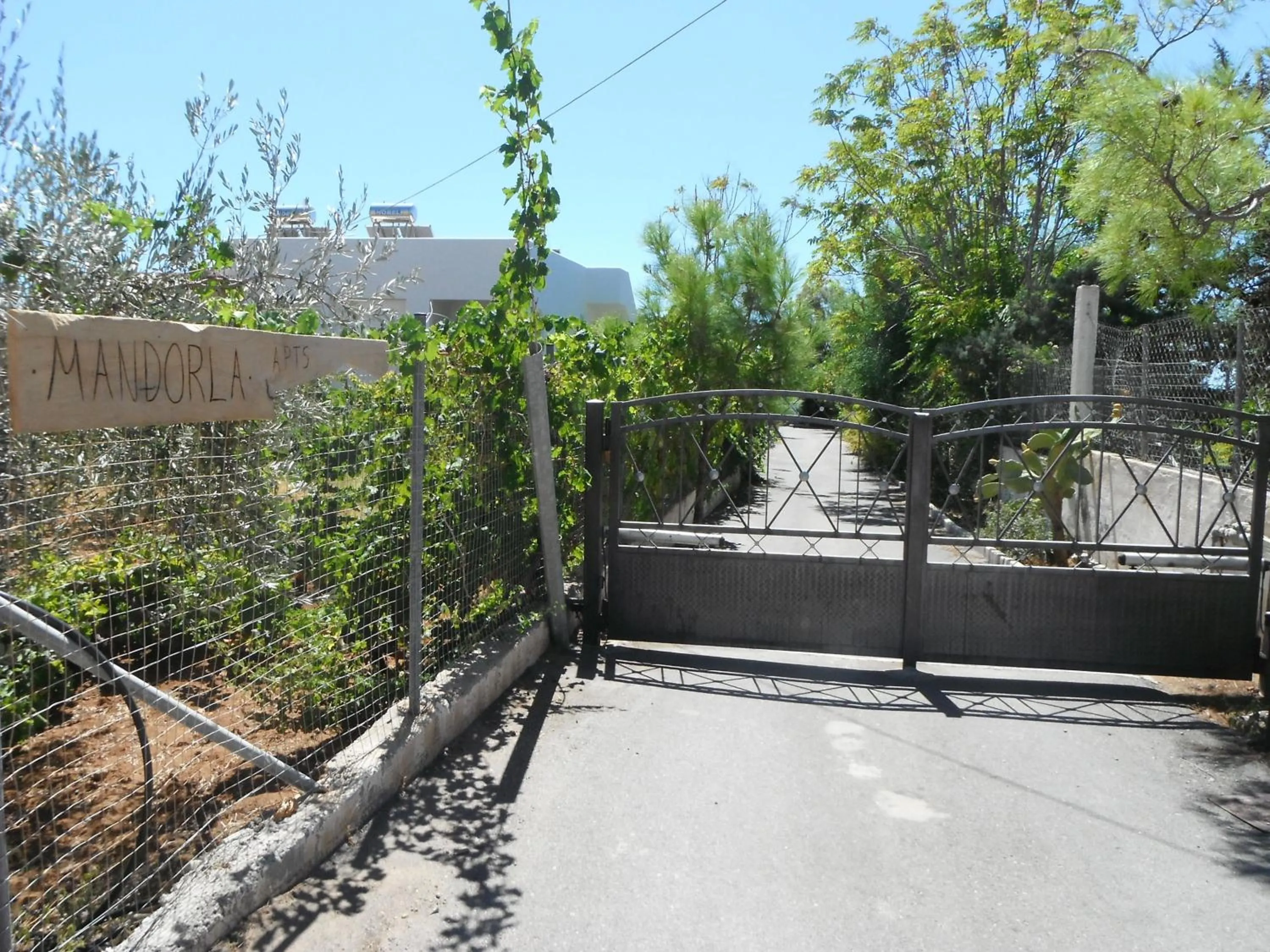 Property logo or sign in Mandorla Apartments