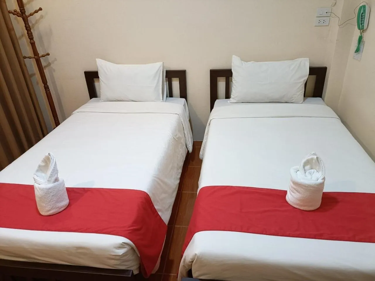 Bed in โรงแรมแอมไอม่อน - Am Amoonds Hotel