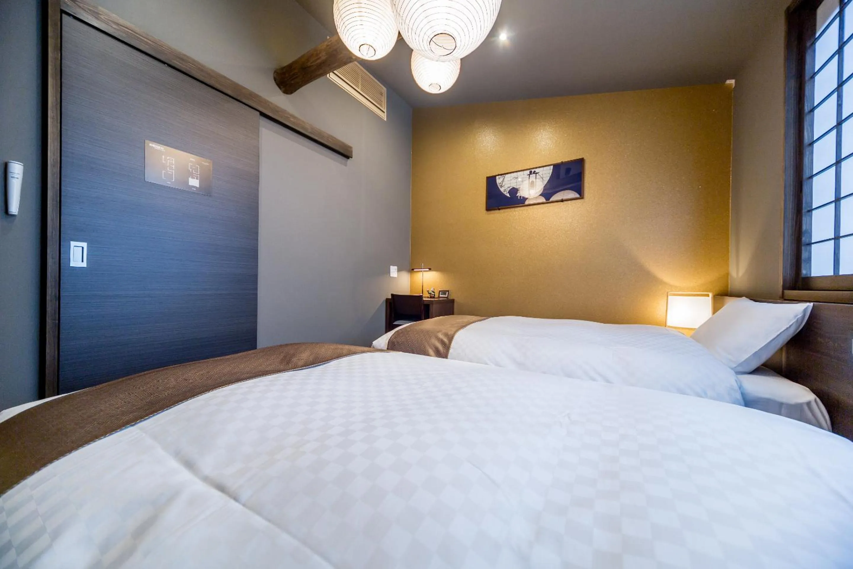 Bed in RESI STAY Yasaka-an