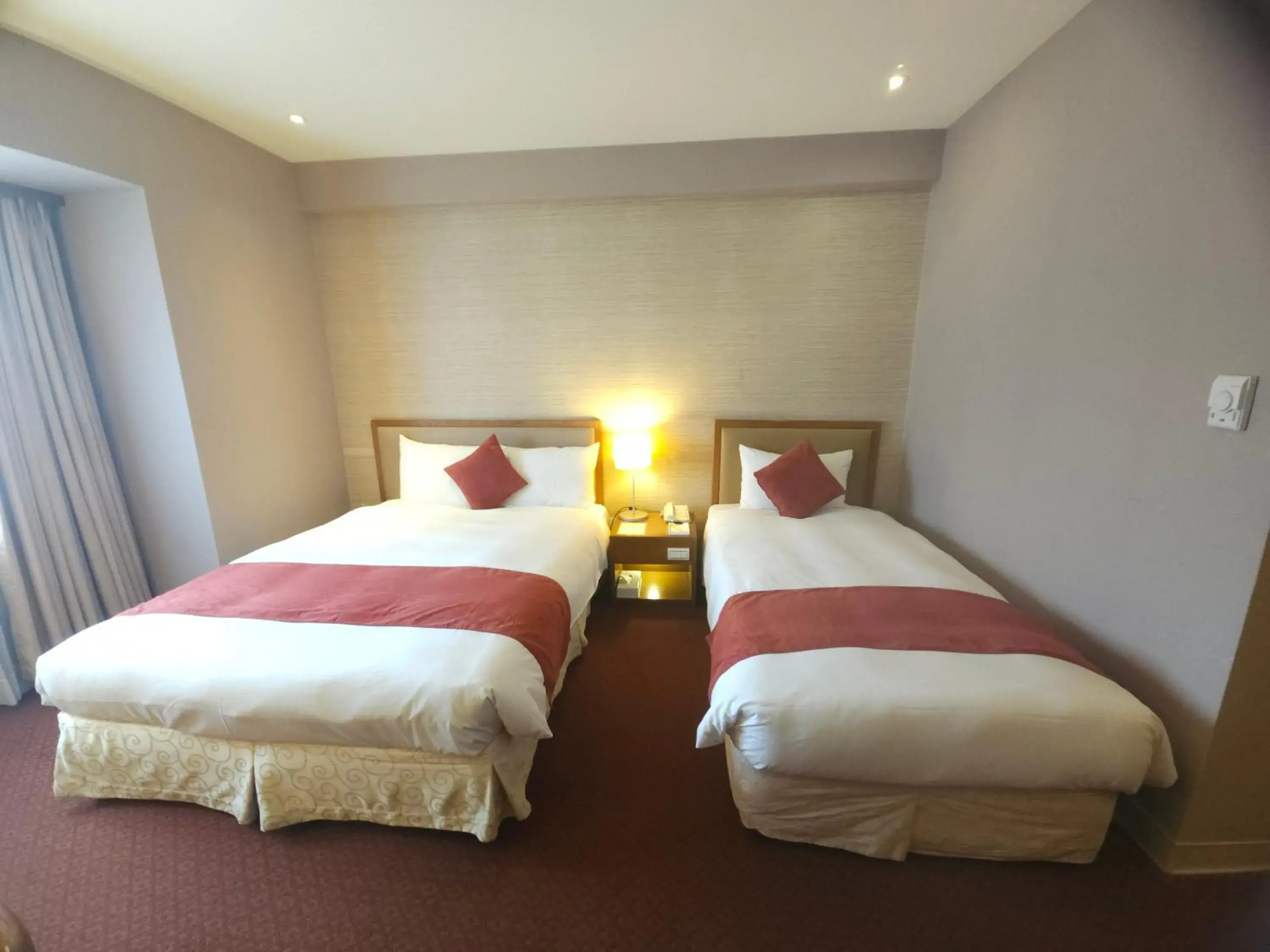 Bed in Hotel Riverview Taipei Bed in Hotel Riverview Taipei