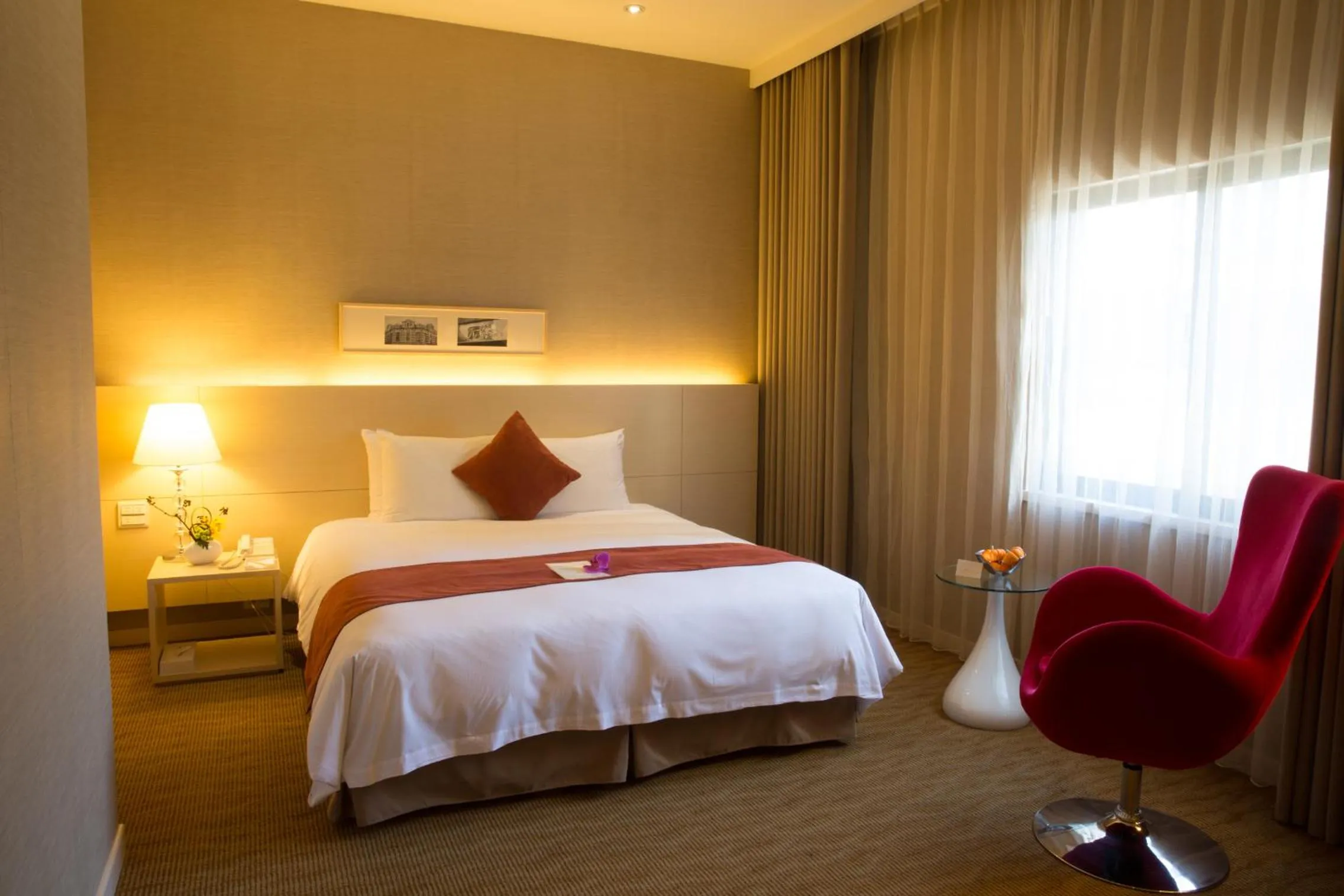 Bed in Hotel Riverview Taipei