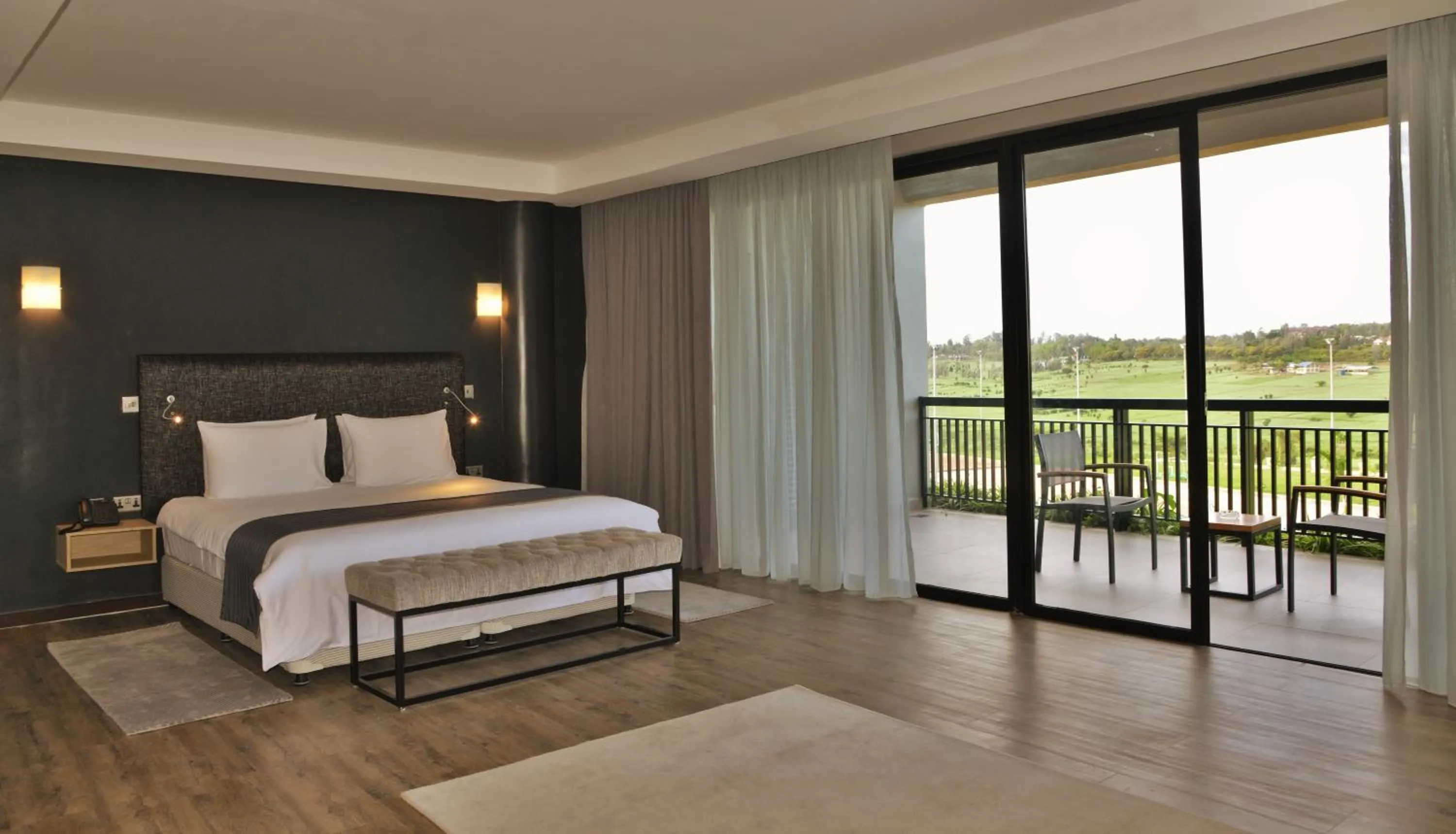 Garden view, Bed in EPIC Hotel & Suites