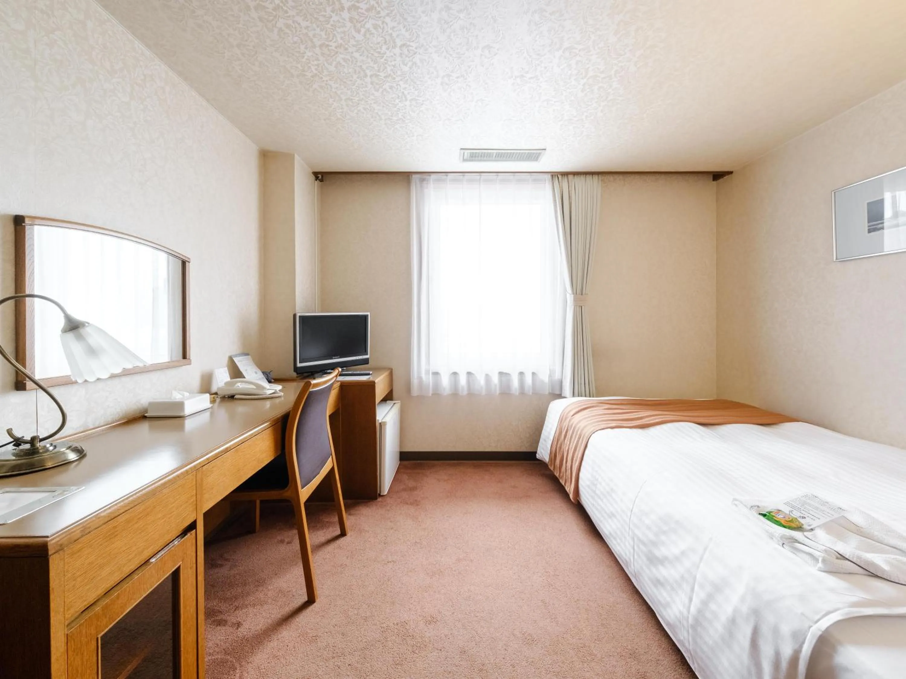 Bed in Tabist Abashiri Central Hotel