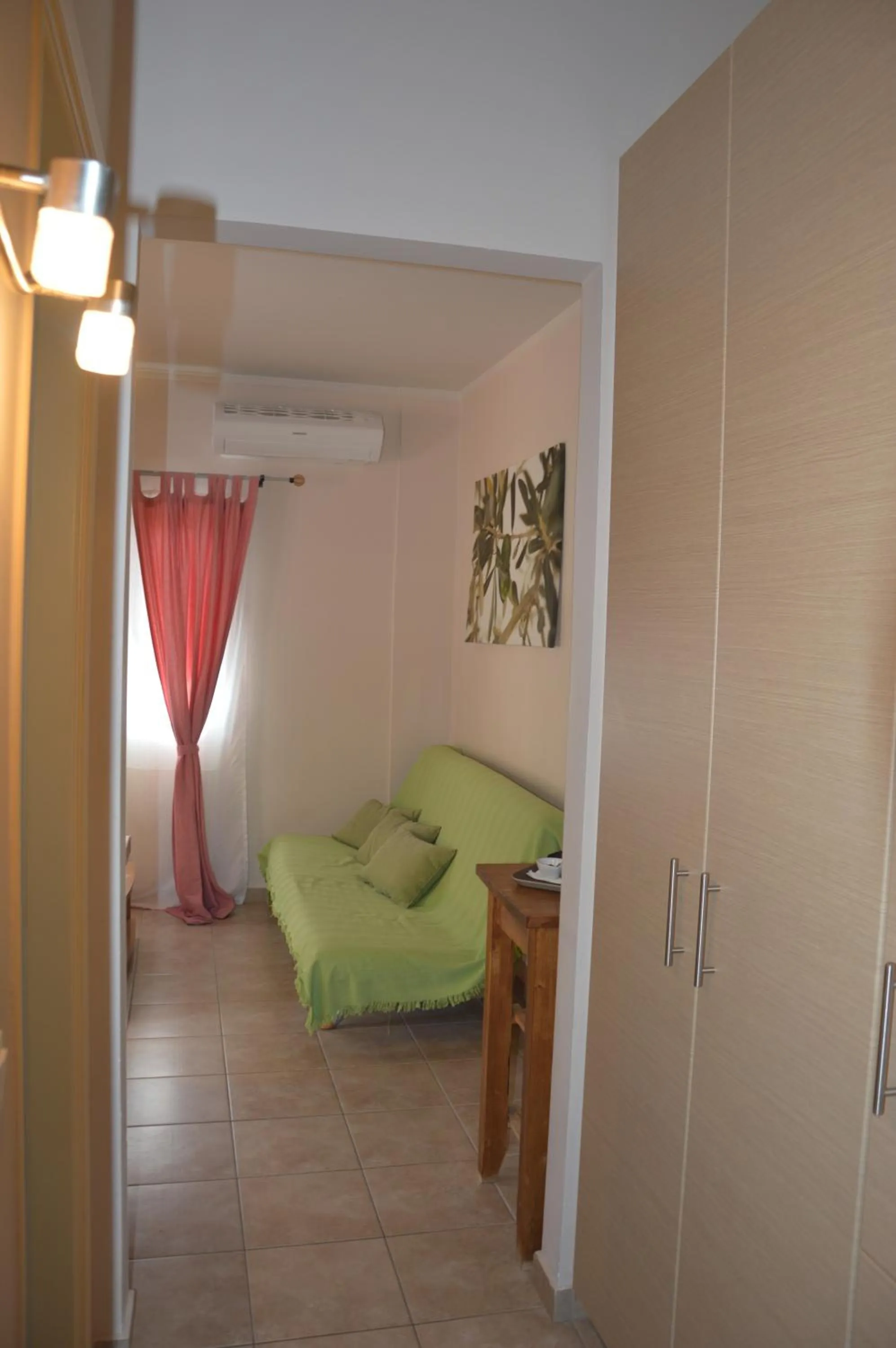 Living room, Bed in Akis Apartments