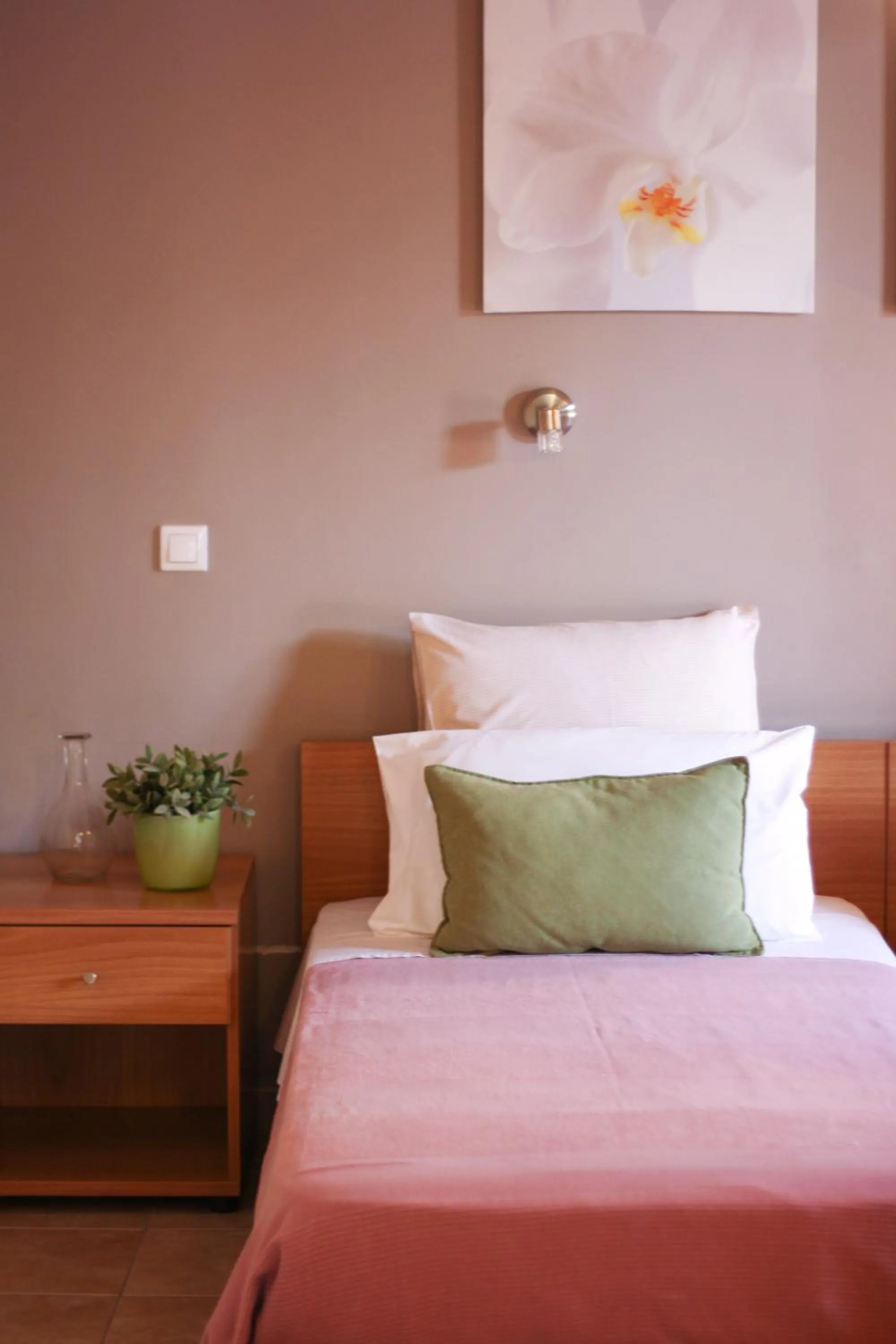 Bed in Akis Apartments