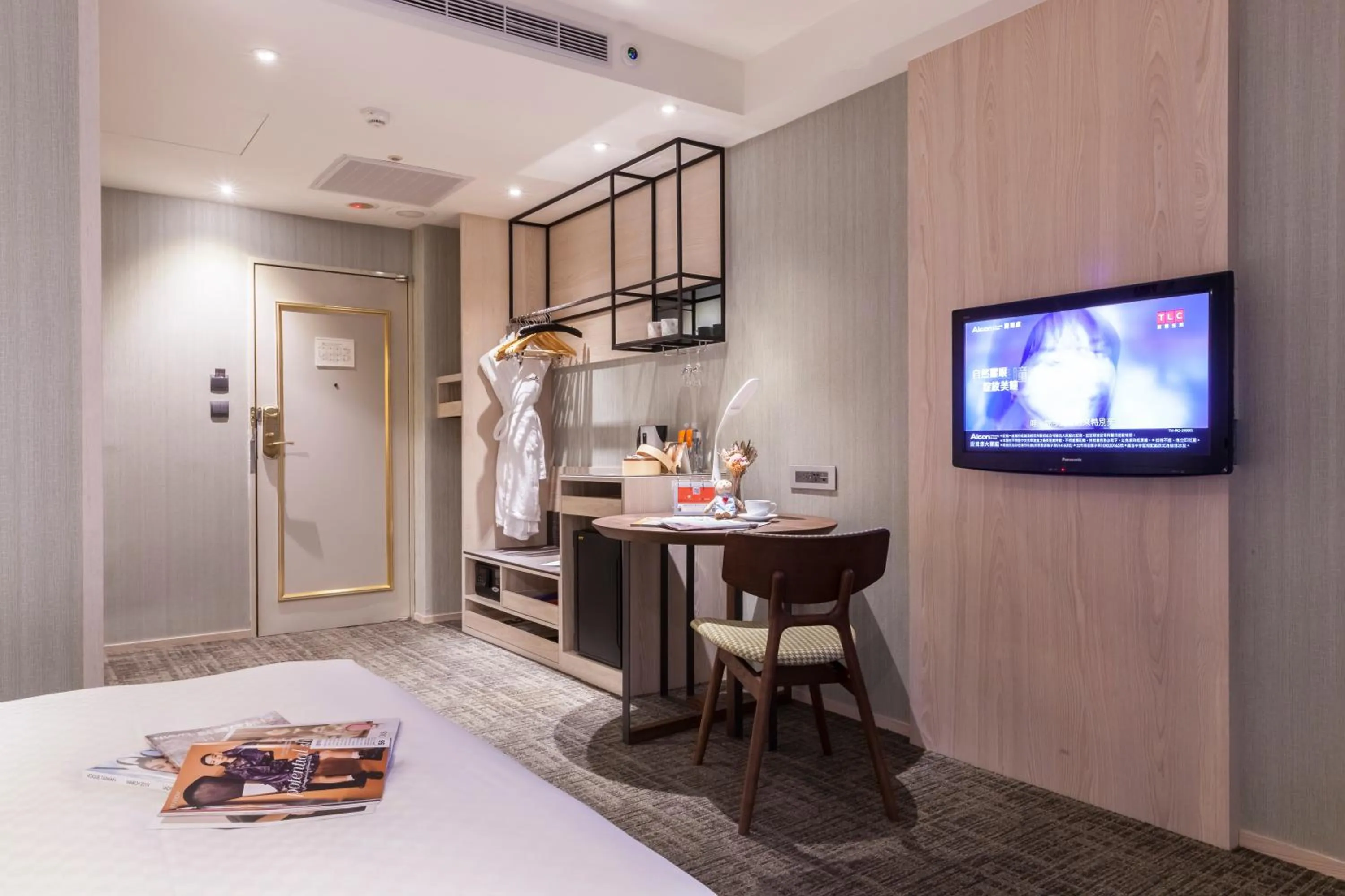 Bed in Pacific Business Hotel