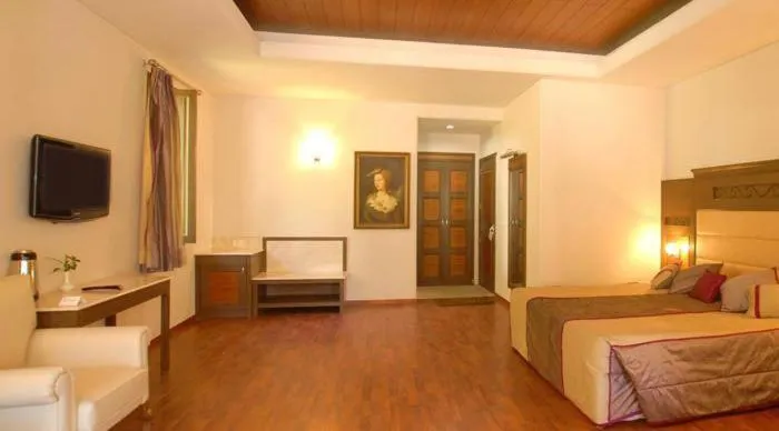 TV and multimedia, Bed in Vikram Vintage Inn