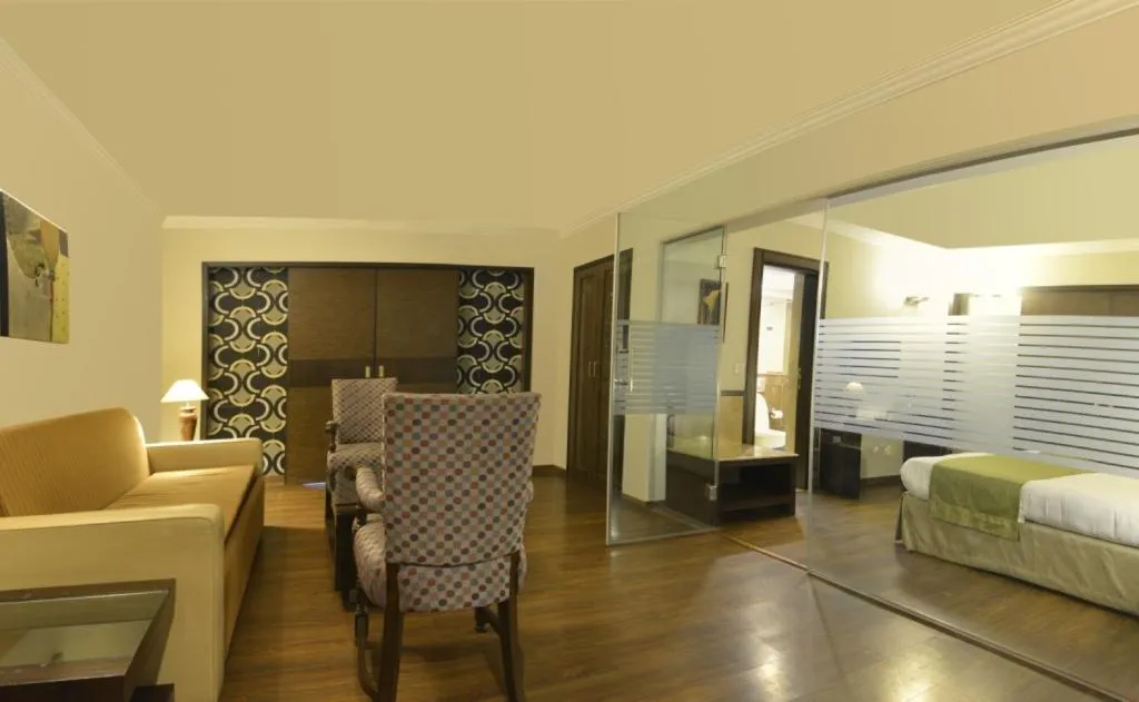 Living room, Bed in Vikram Vintage Inn