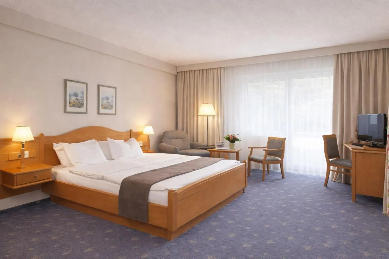 Living room, Bed in Hotel Nordkap