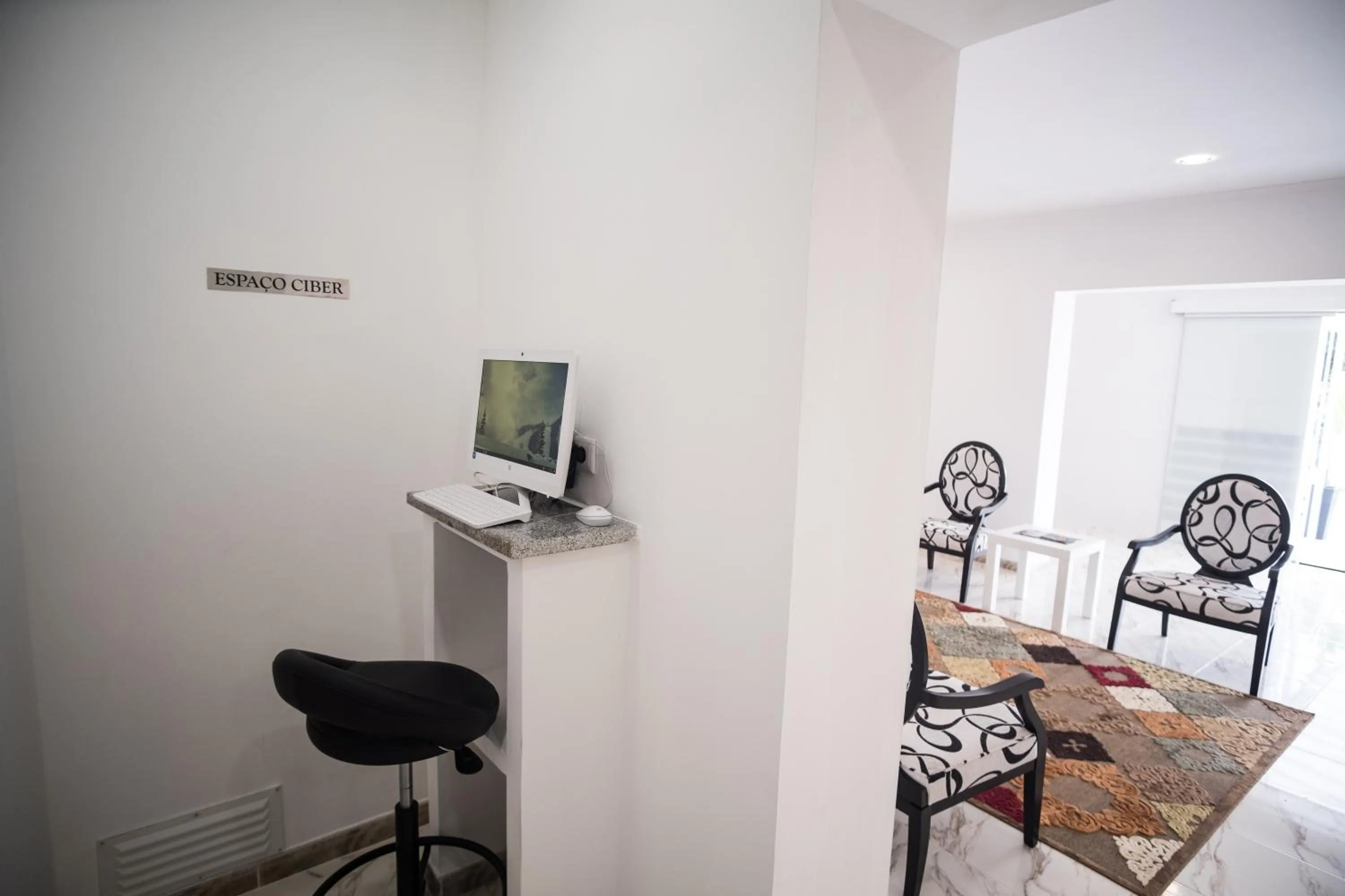 Communal lounge/ TV room in SH Boutique Hotel