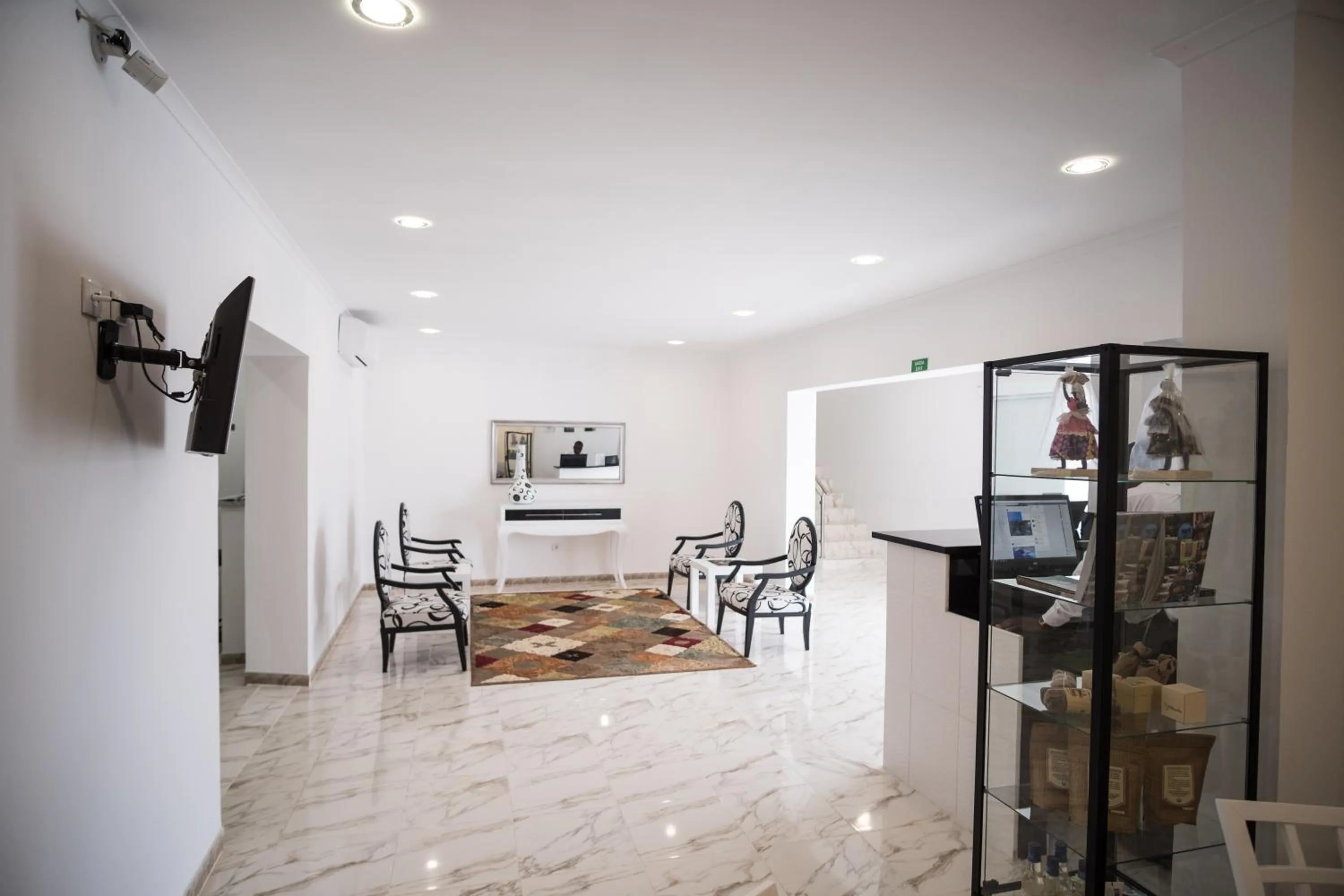 Communal lounge/ TV room in SH Boutique Hotel