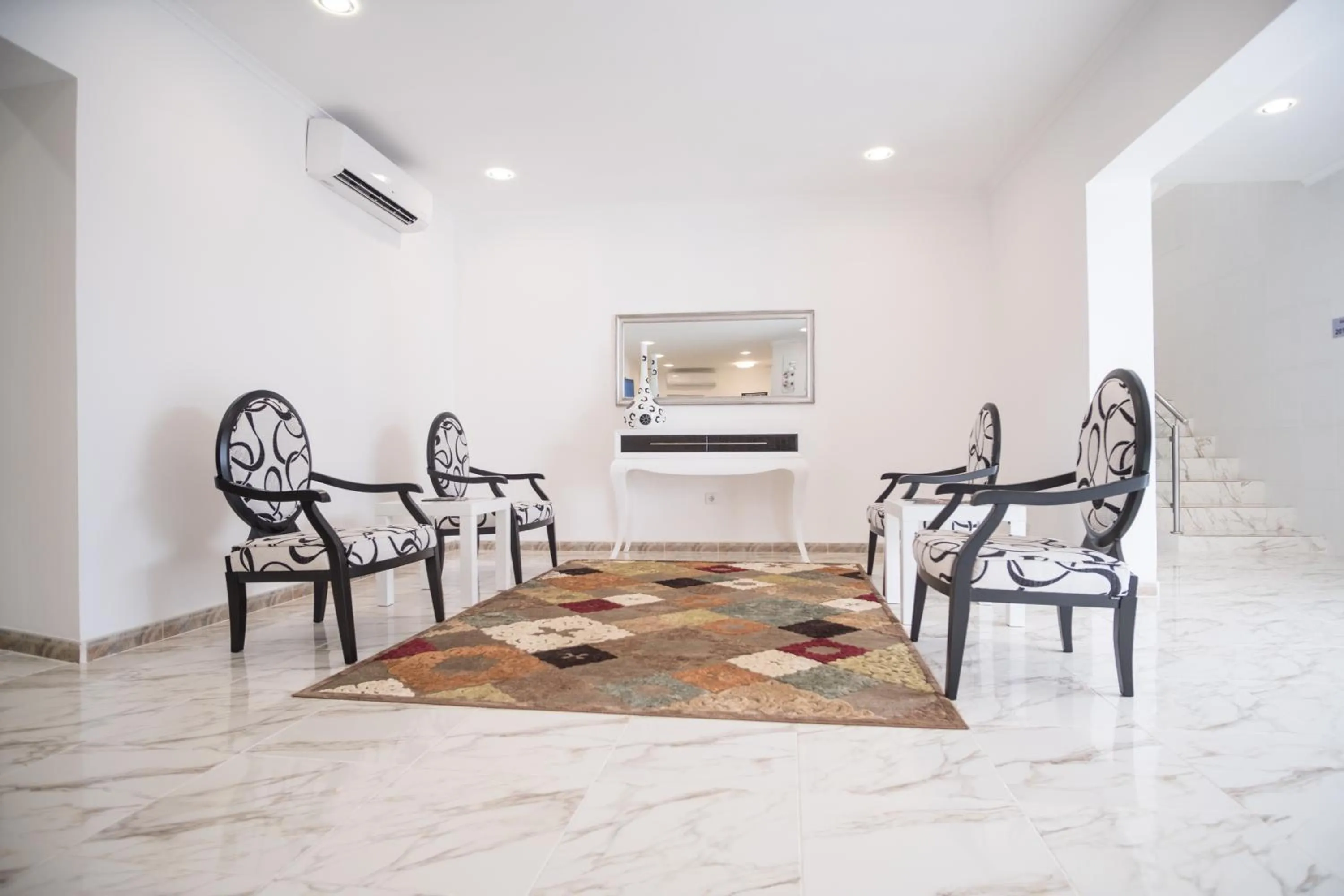 Communal lounge/ TV room in SH Boutique Hotel