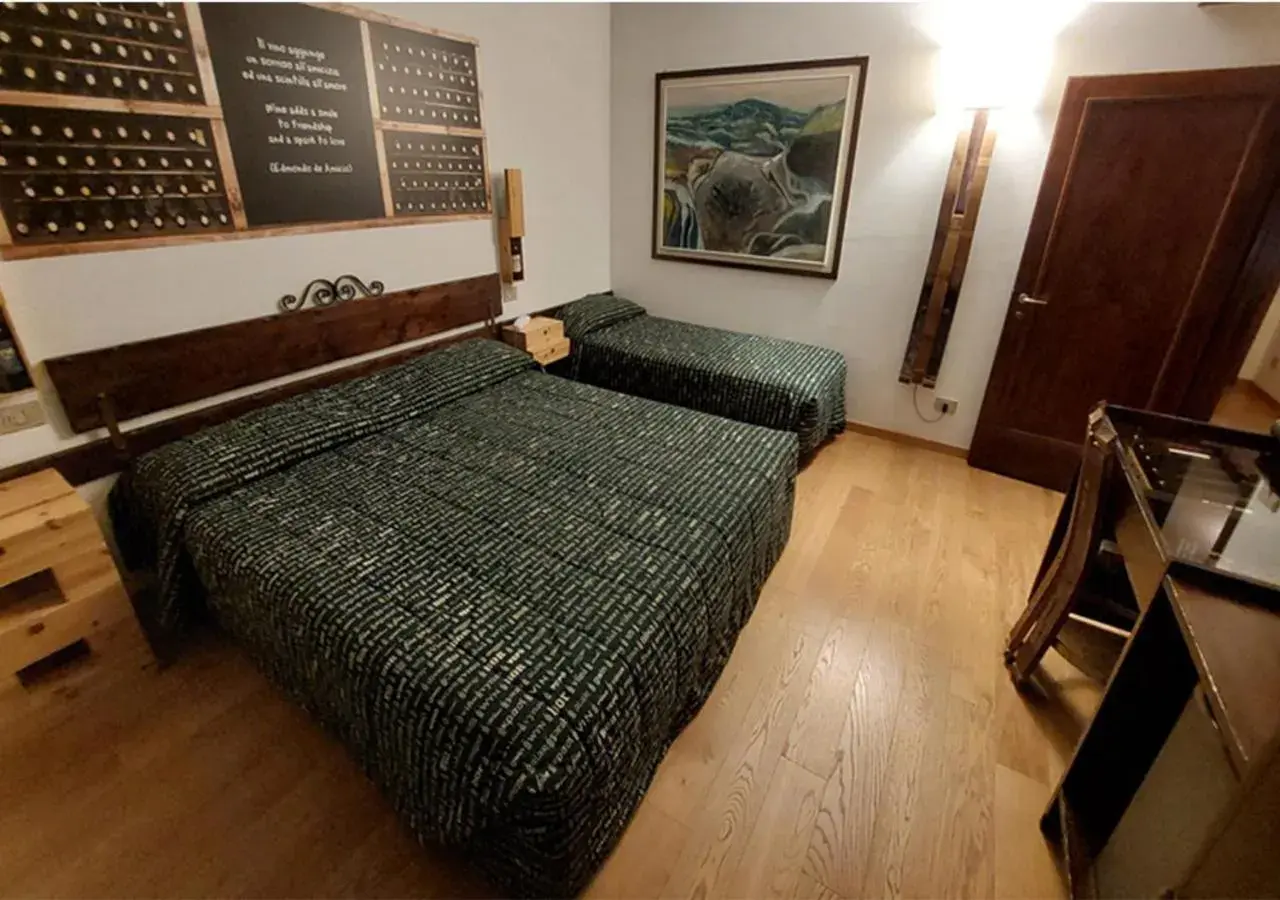 Bed in Hotel Giò Wine e Jazz Area Bed in Hotel Giò Wine e Jazz Area