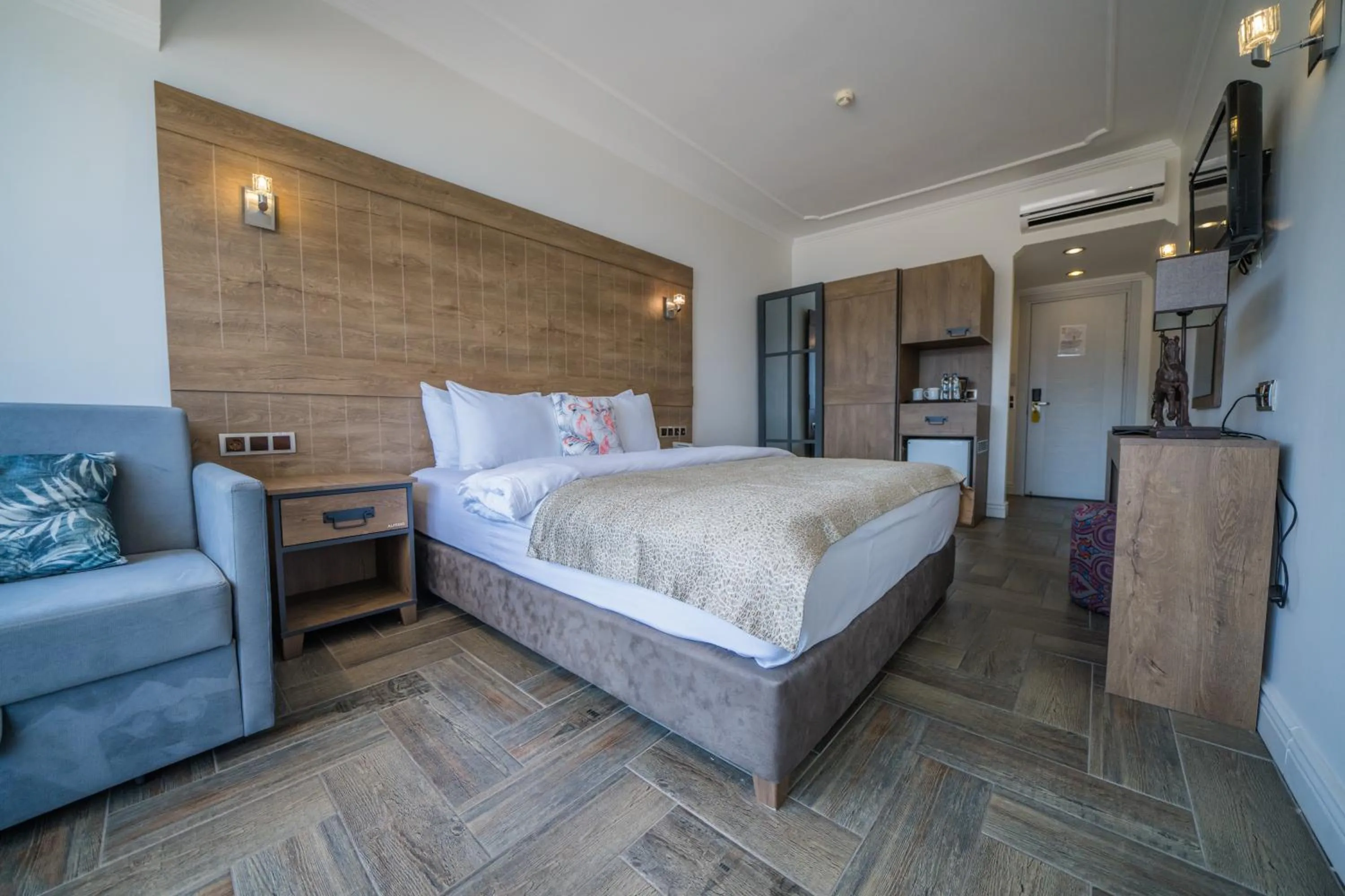 Bed in Aurasia Beach Hotel